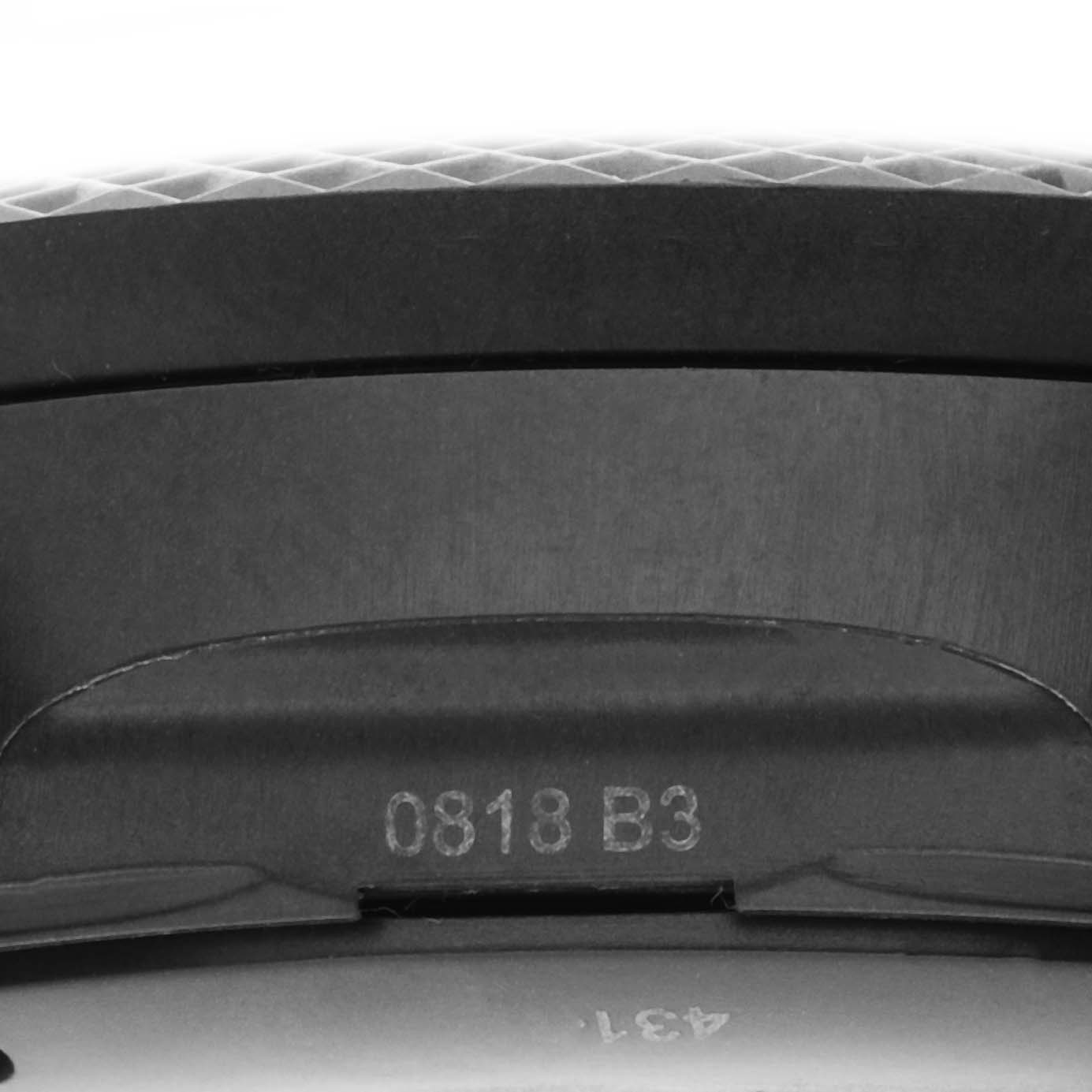 The image shows the side profile of a Breitling Bentley XB0613C1/C984 Men
s Ceramic Blue Dial XB0613C1/C984 Men
s Ceramic Blue Dial watch with its engraved details visible.