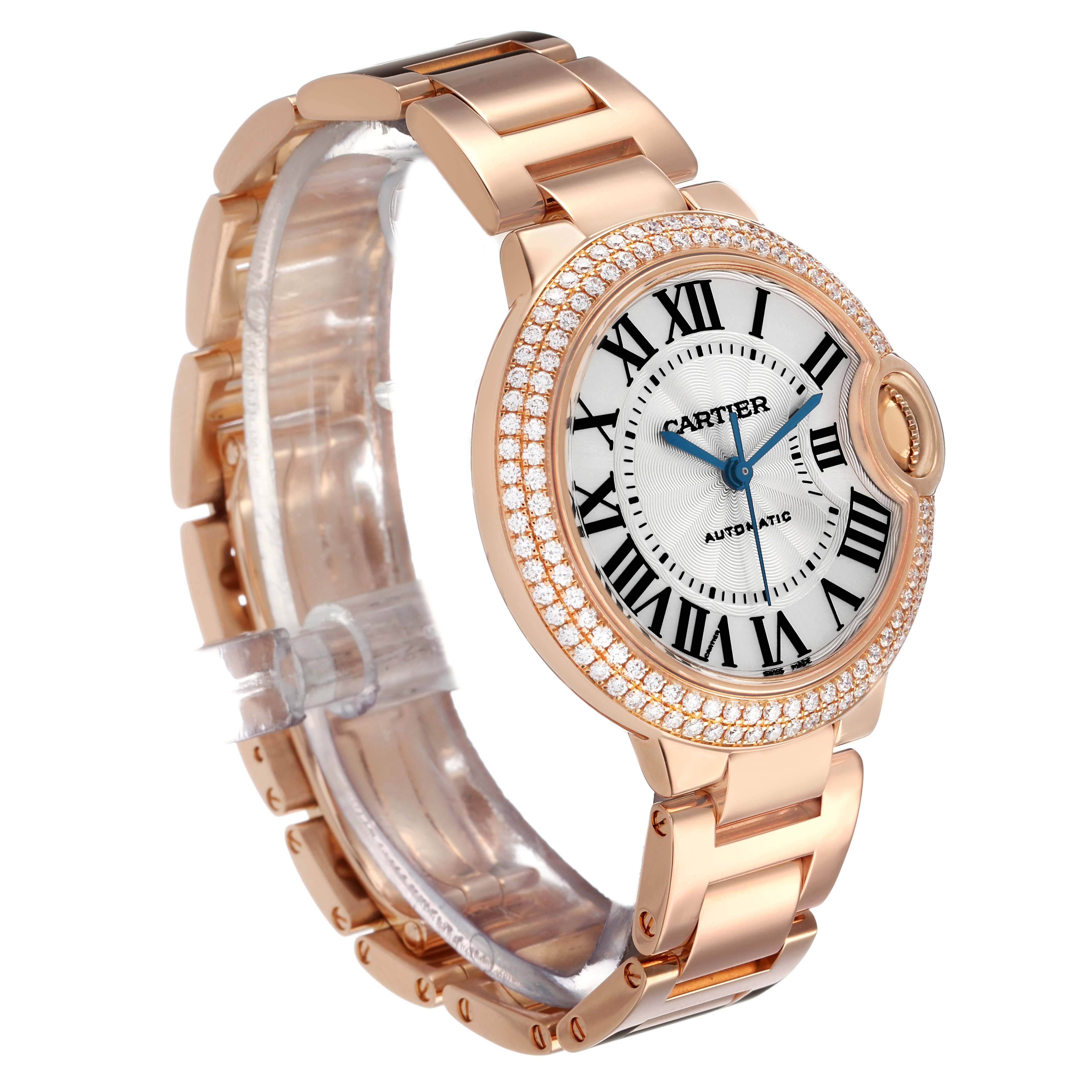 The Cartier Ballon Bleu 79017 Women's Rose Gold Silver Dial watch is shown at a three-quarter angle, highlighting the face, bracelet, and diamond-set bezel.
