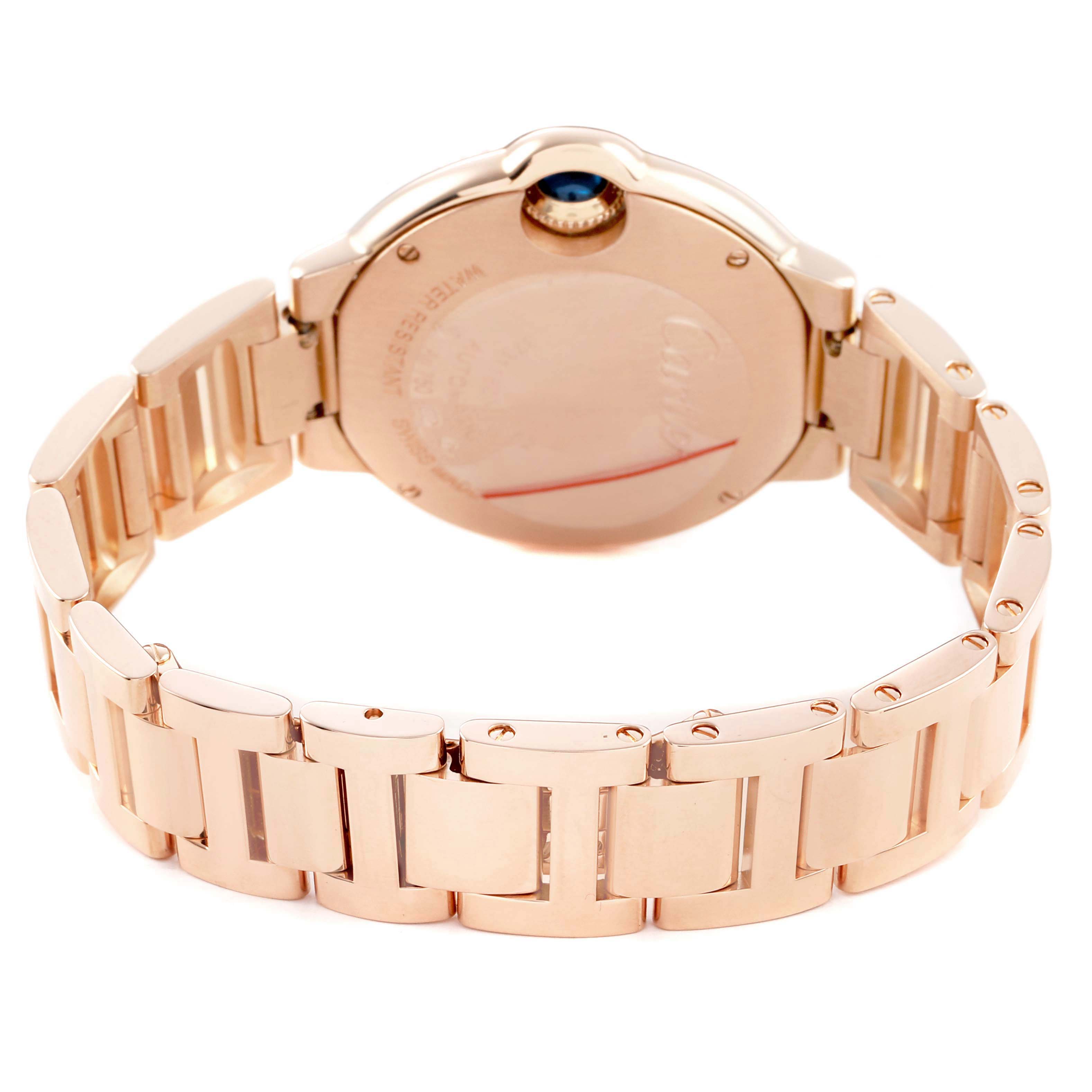 The image shows the back view of a Cartier Ballon Bleu 79017 Women's Rose Gold Silver Dial watch with its band and clasp visible.