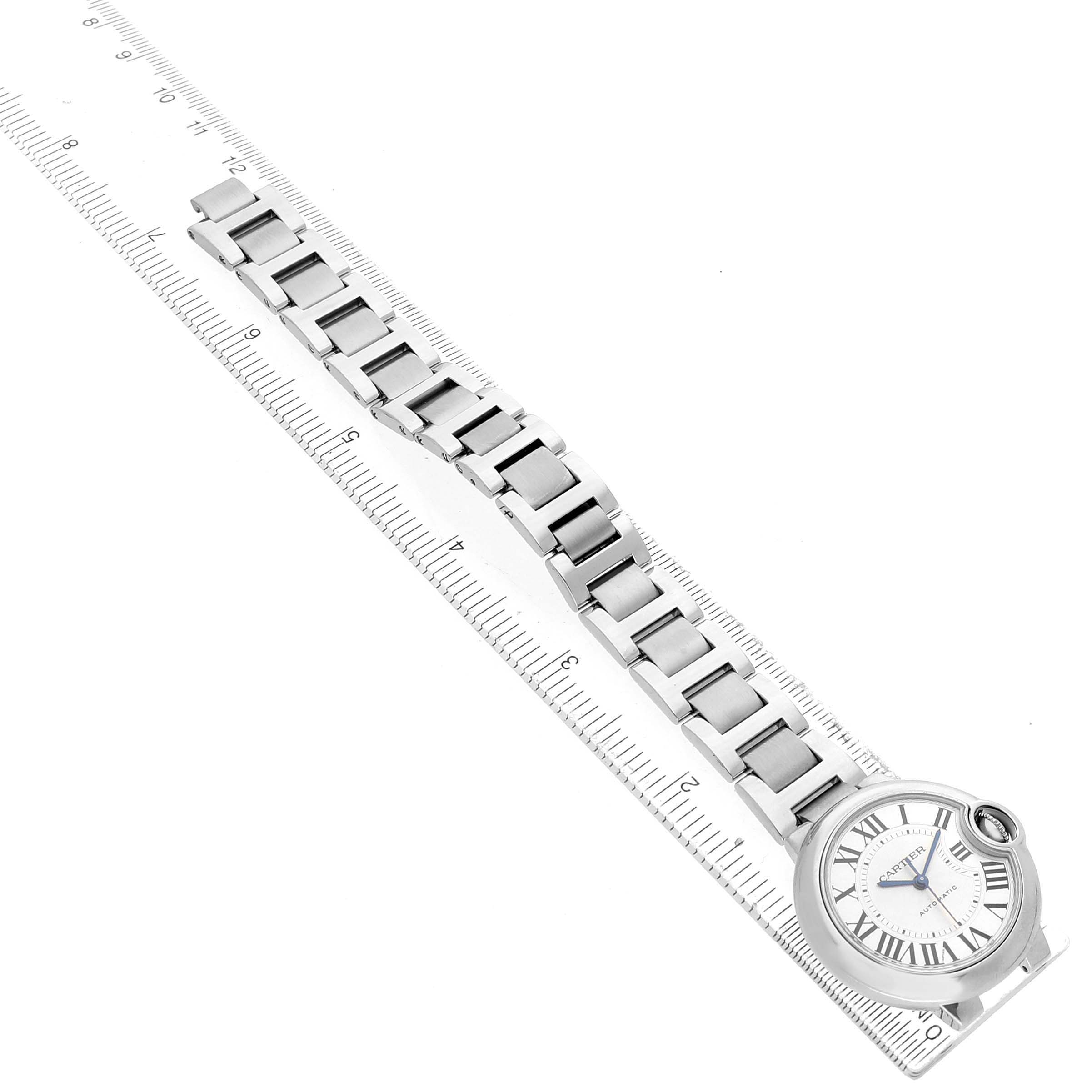 The Cartier Ballon Bleu W6920071 Women's Stainless Steel Silver Dial watch is shown from a top-down angle, displaying its face and the entire metal bracelet.