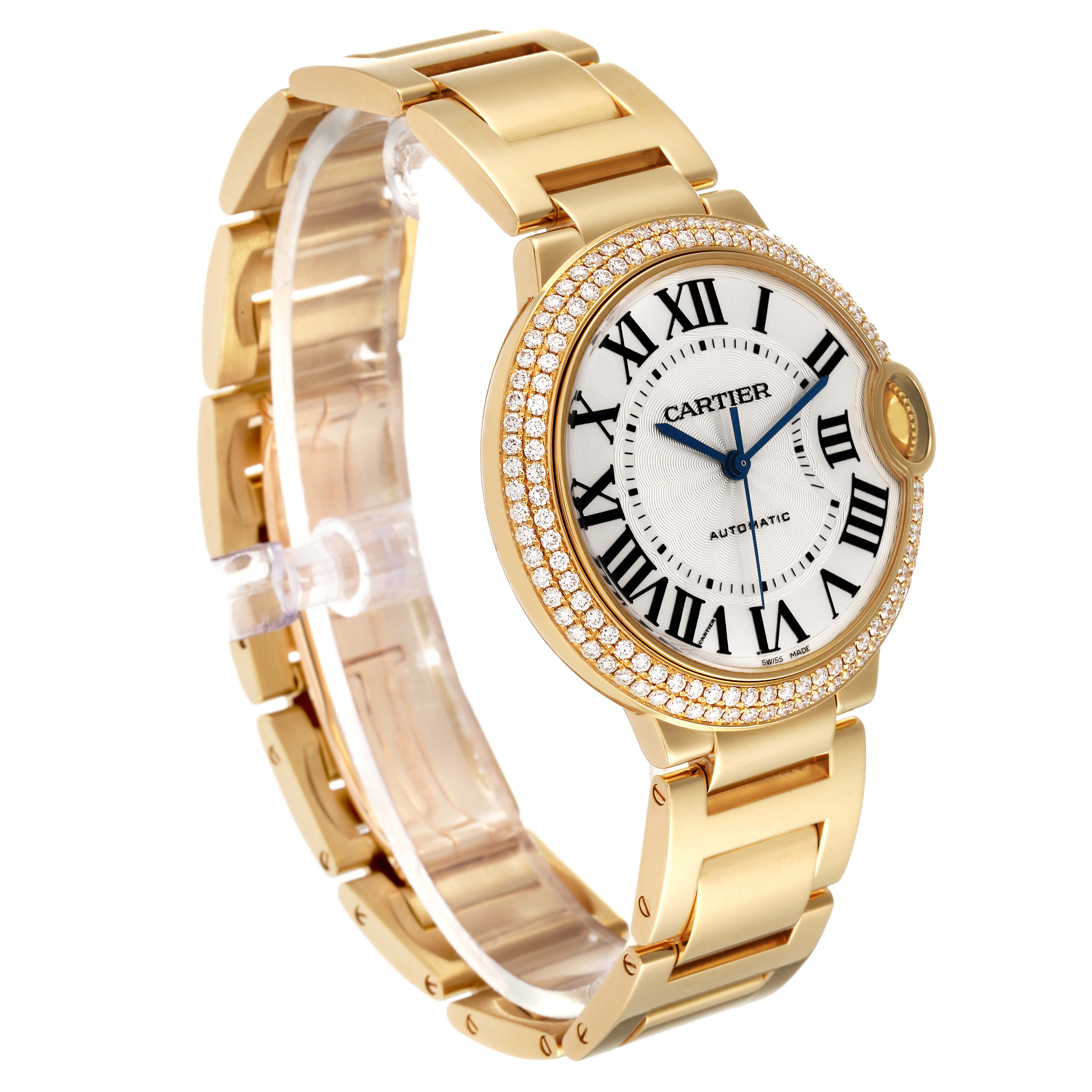 This image shows a side and front view of the Cartier Ballon Bleu WE9004Z3 Women
s Yellow Gold Silver Dial WE9004Z3 Women
s Yellow Gold Silver Dial watch, highlighting its gold bracelet and diamond bezel.