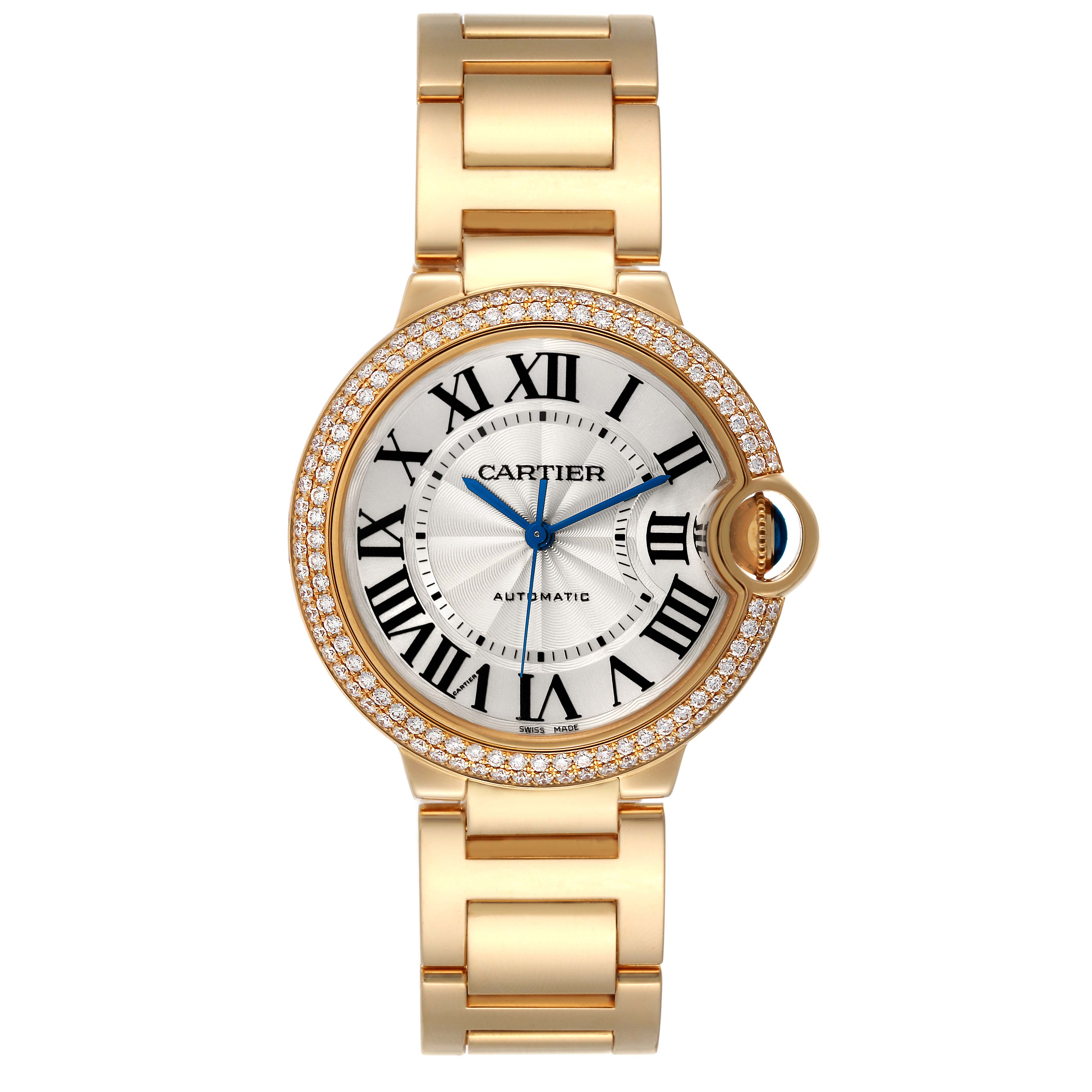 The image shows a front view of the Cartier Ballon Bleu WE9004Z3 Women
s Yellow Gold Silver Dial WE9004Z3 Women
s Yellow Gold Silver Dial watch, featuring its dial, bracelet, and a diamond-encrusted bezel.