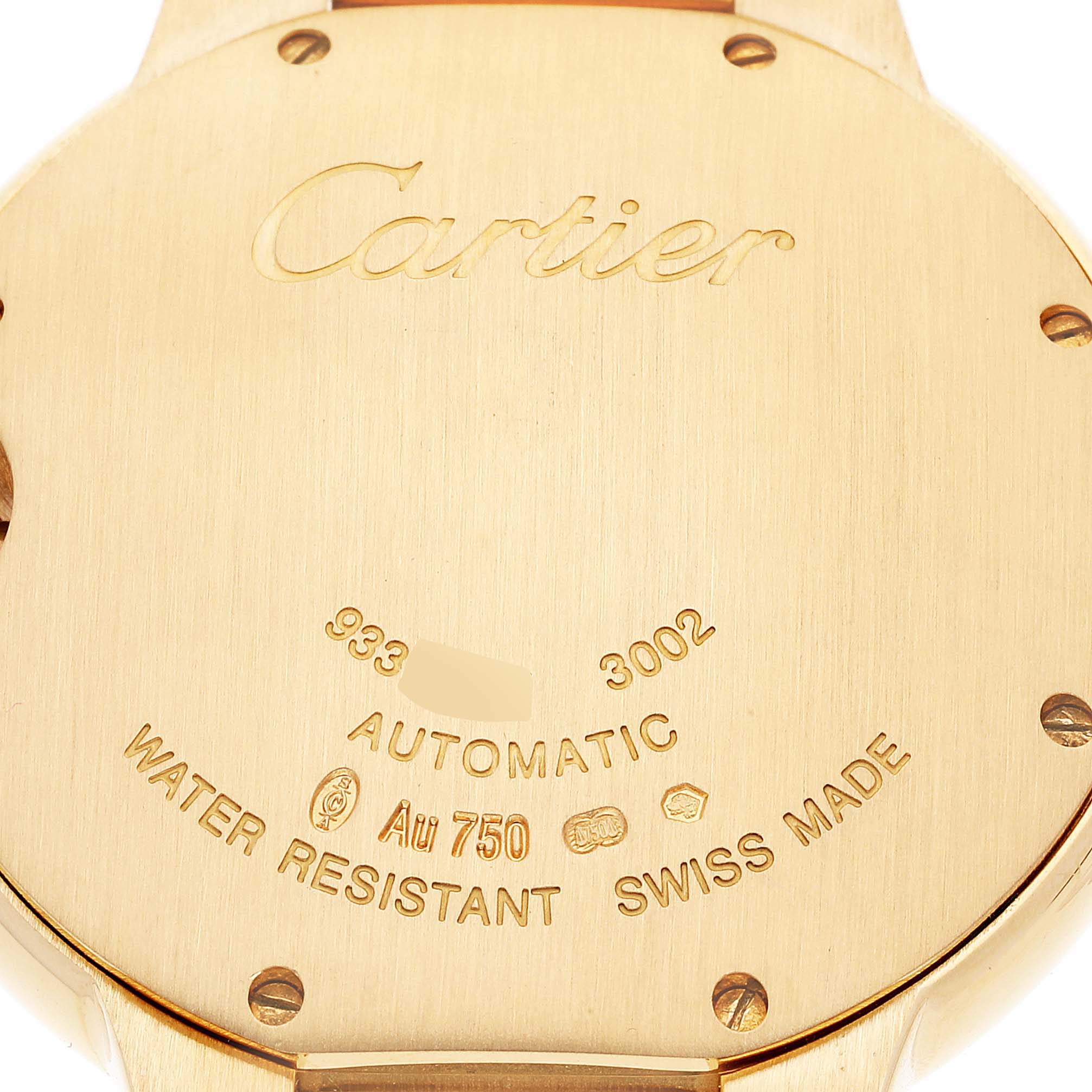 The image shows the back case of a Cartier Ballon Bleu WE9004Z3 Women
s Yellow Gold Silver Dial WE9004Z3 Women
s Yellow Gold Silver Dial watch with engravings and screws visible.