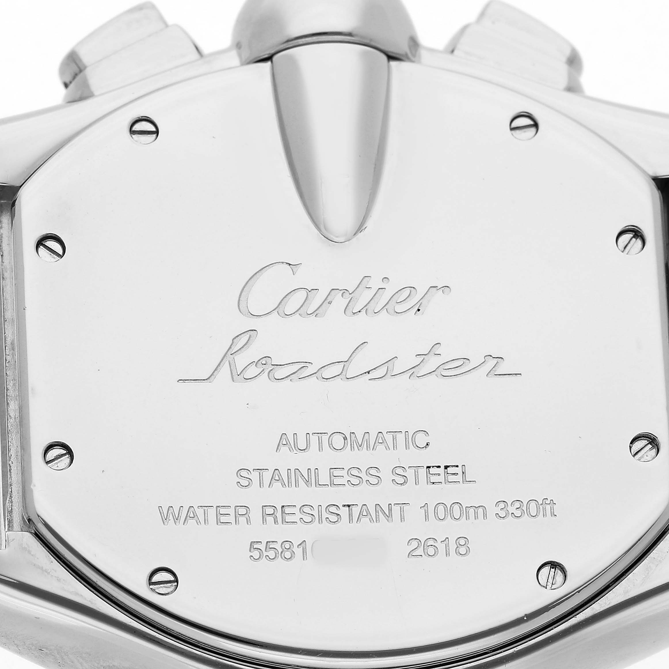 The image shows the back of a Cartier Roadster W62019X6 Men's Stainless Steel Silver Dial watch, highlighting its stainless steel and water resistance details.