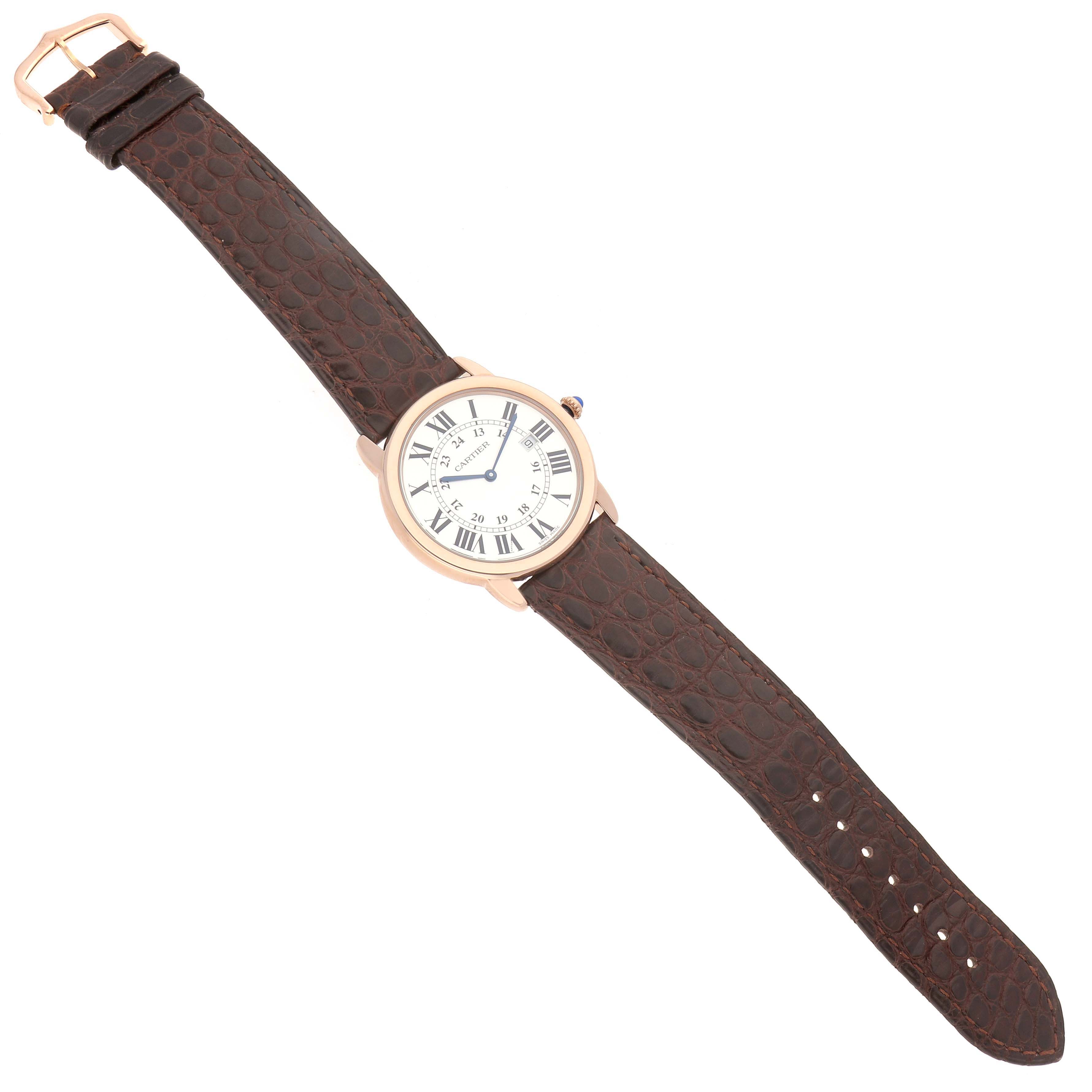 The Cartier Ronde W6701008 Men's Steel and Gold (two tone) Silver Dial W6701008 Men's Steel and Gold (two tone) Silver Dial watch is shown from a top view, featuring its round face, Roman numerals, and a brown leather strap.