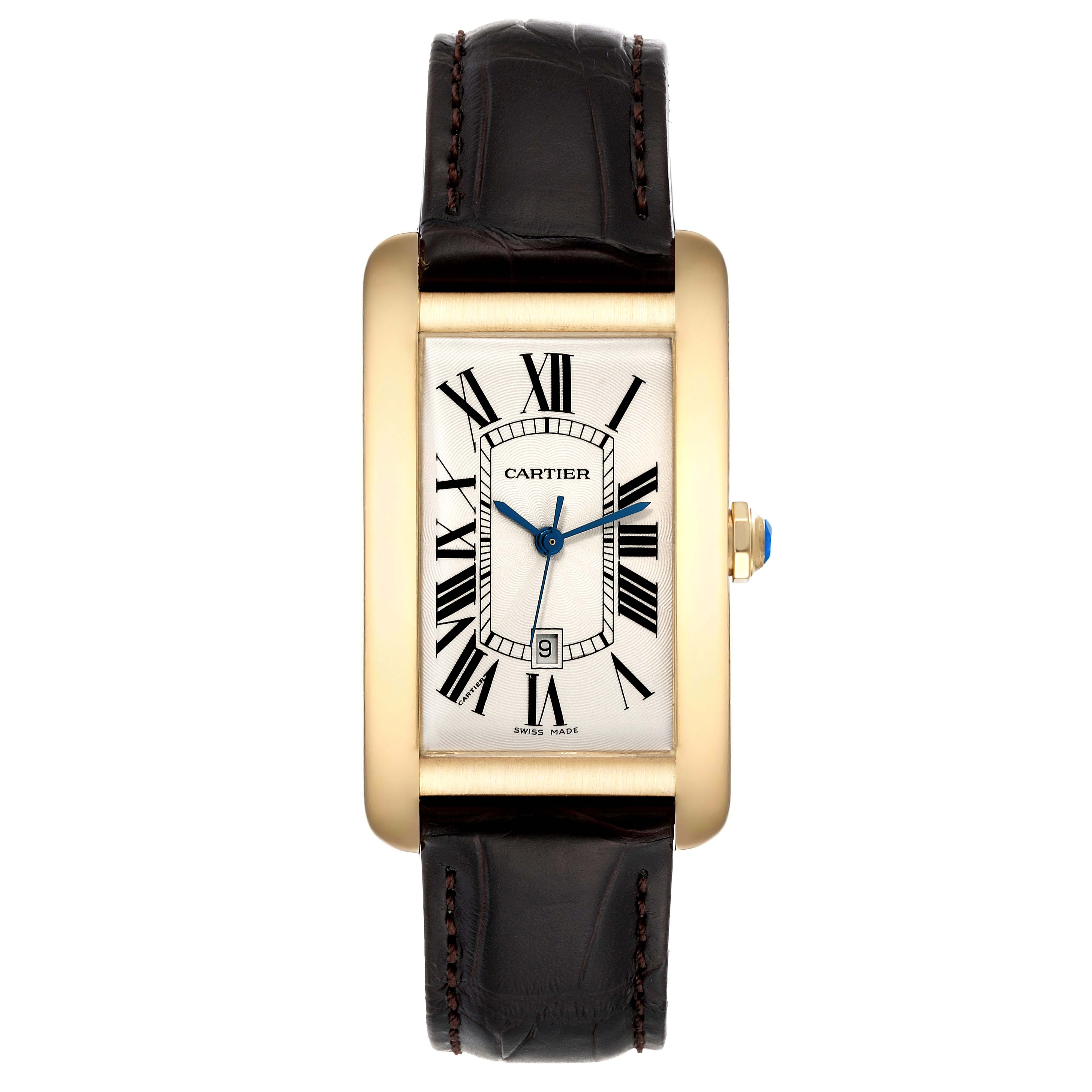 The image shows a front view of a Cartier Tank Americaine W2603156 Men
s Yellow Gold Silver Dial W2603156 Men
s Yellow Gold Silver Dial watch, displaying its rectangular dial, Roman numerals, and leather strap.