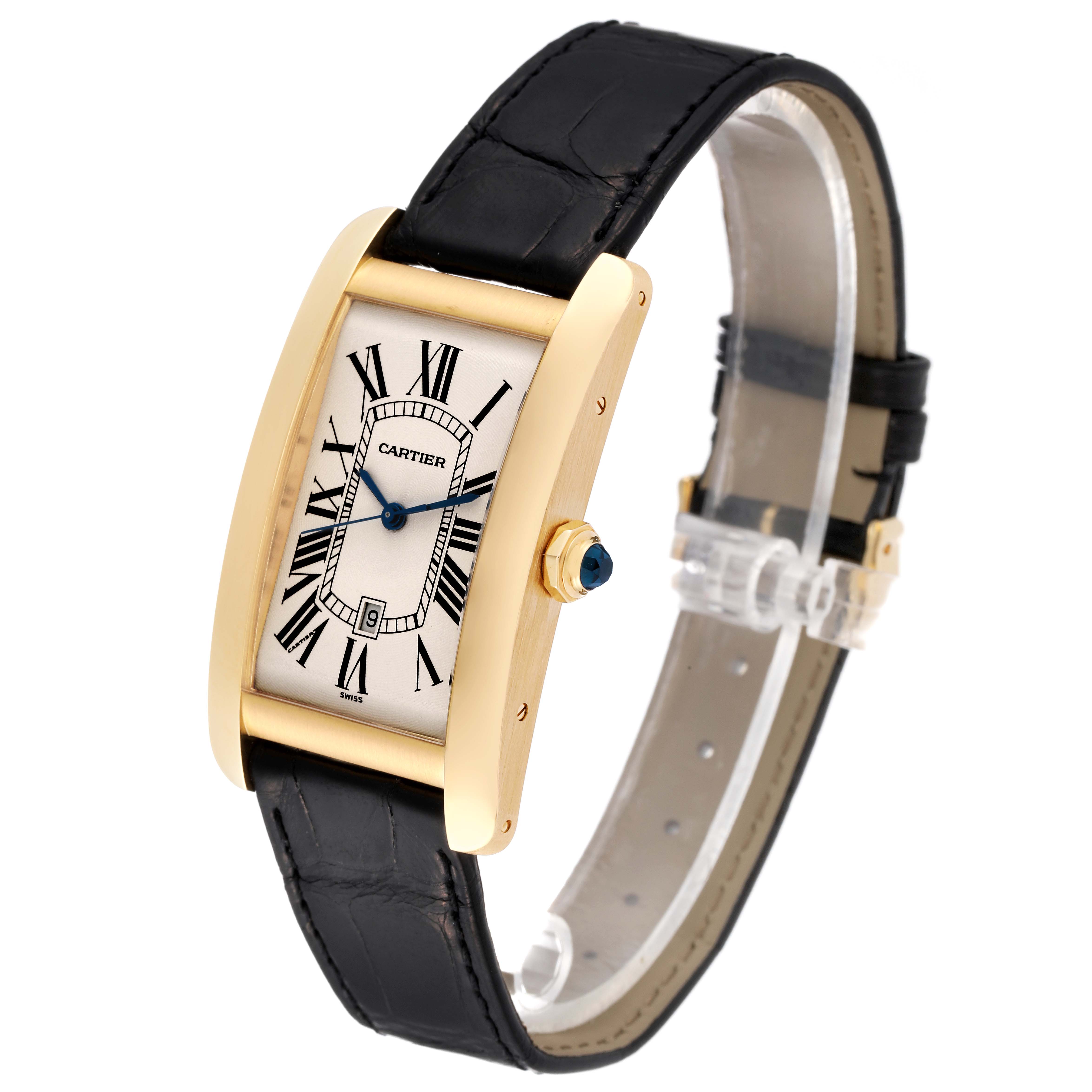 This Cartier Tank Américaine watch is shown at a slight angle, displaying its rectangular face, black leather strap, and gold casing.