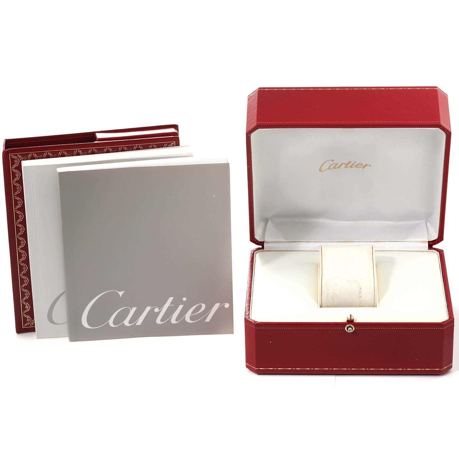 The image shows the Cartier Tank Americaine W2603156 Men's Yellow Gold Silver Dial W2603156 Men's Yellow Gold Silver Dial watch box, manuals, and red outer packaging.