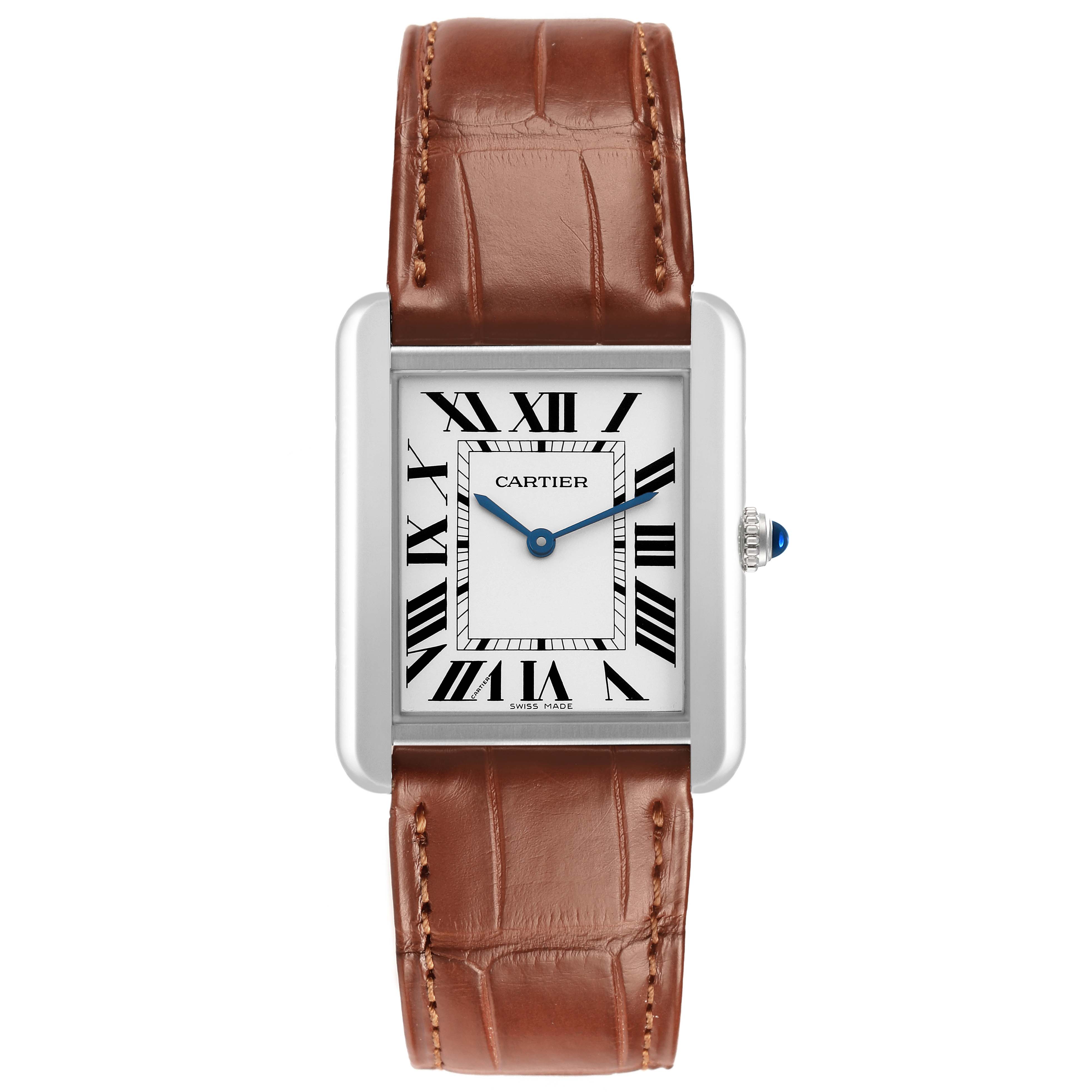 This Cartier Tank Solo WSTA0028 Women's Stainless Steel White Dial watch is shown from a front view, featuring its rectangular dial, Roman numerals, and brown leather strap.