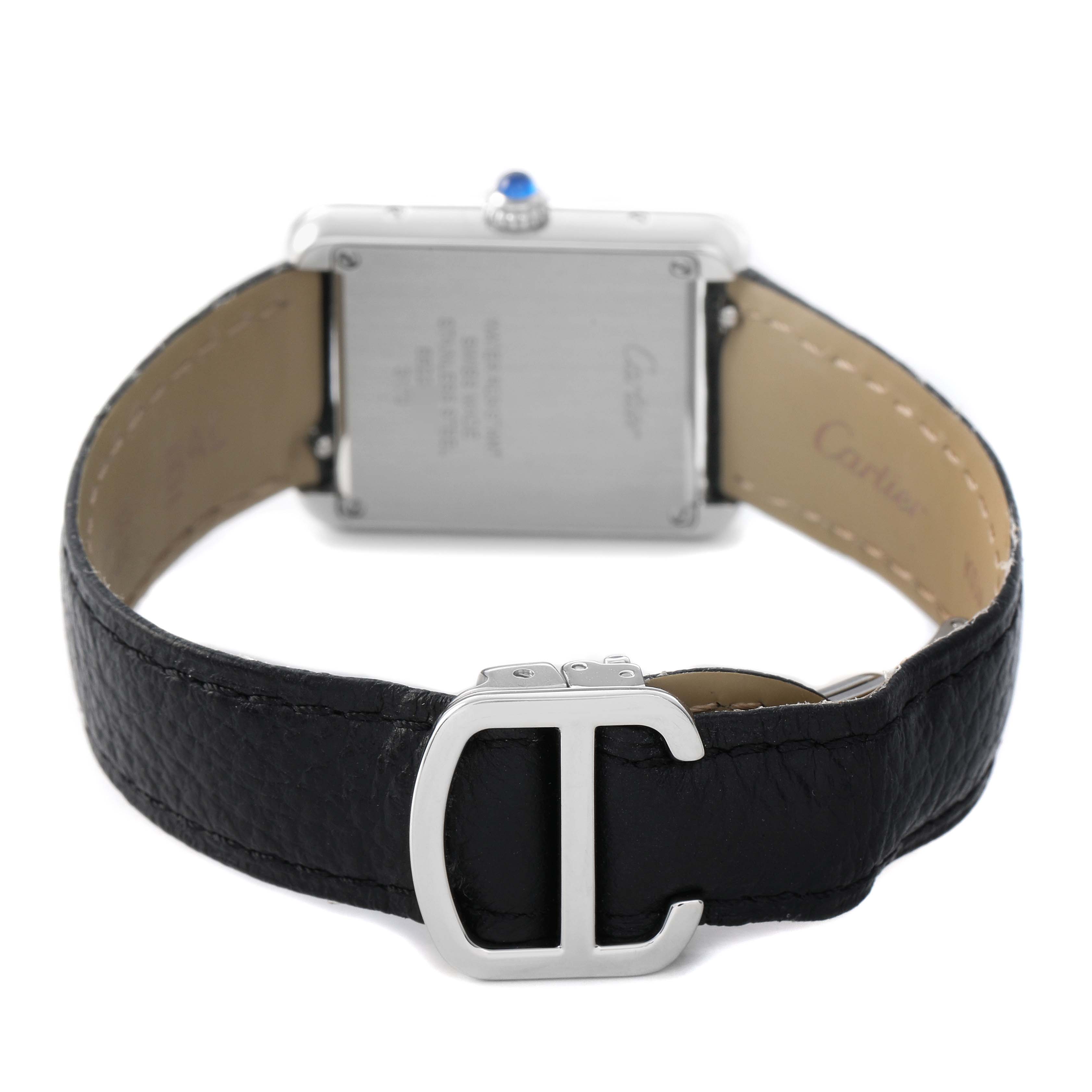 The image shows the back of a Cartier Tank Solo WSTA0030 Women's Stainless Steel Silver Dial watch, highlighting the clasp and leather strap.