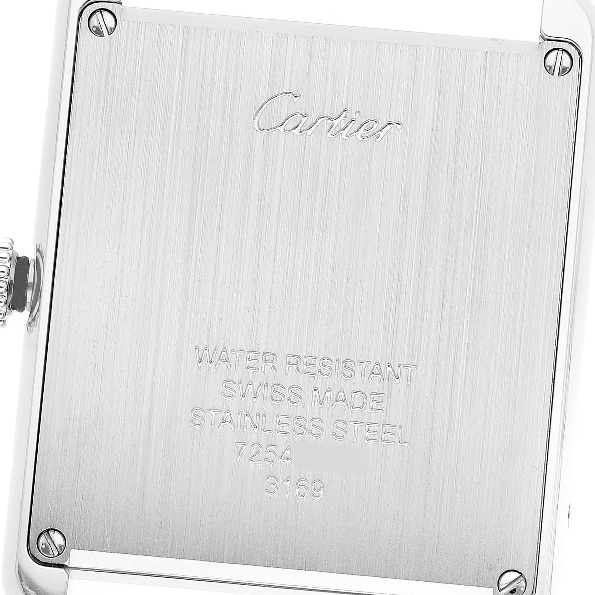 This image shows the back case of a Cartier Tank Solo WSTA0028 Men
s Stainless Steel Silver Dial WSTA0028 Men
s Stainless Steel Silver Dial watch, highlighting the brand engraving and model information.