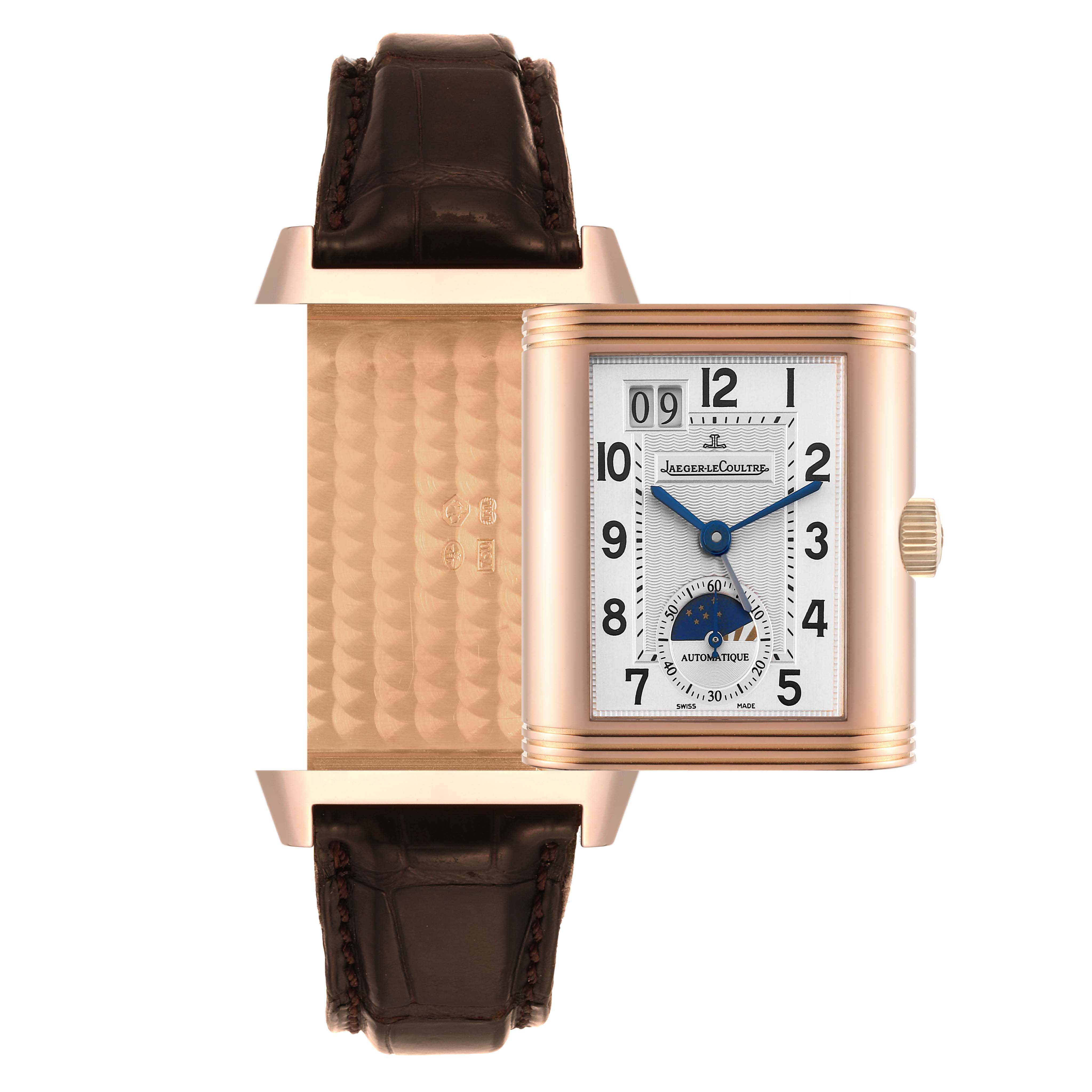 The image shows a Jaeger-LeCoultre Reverso watch with the dial and engraved reverse side angled for display.