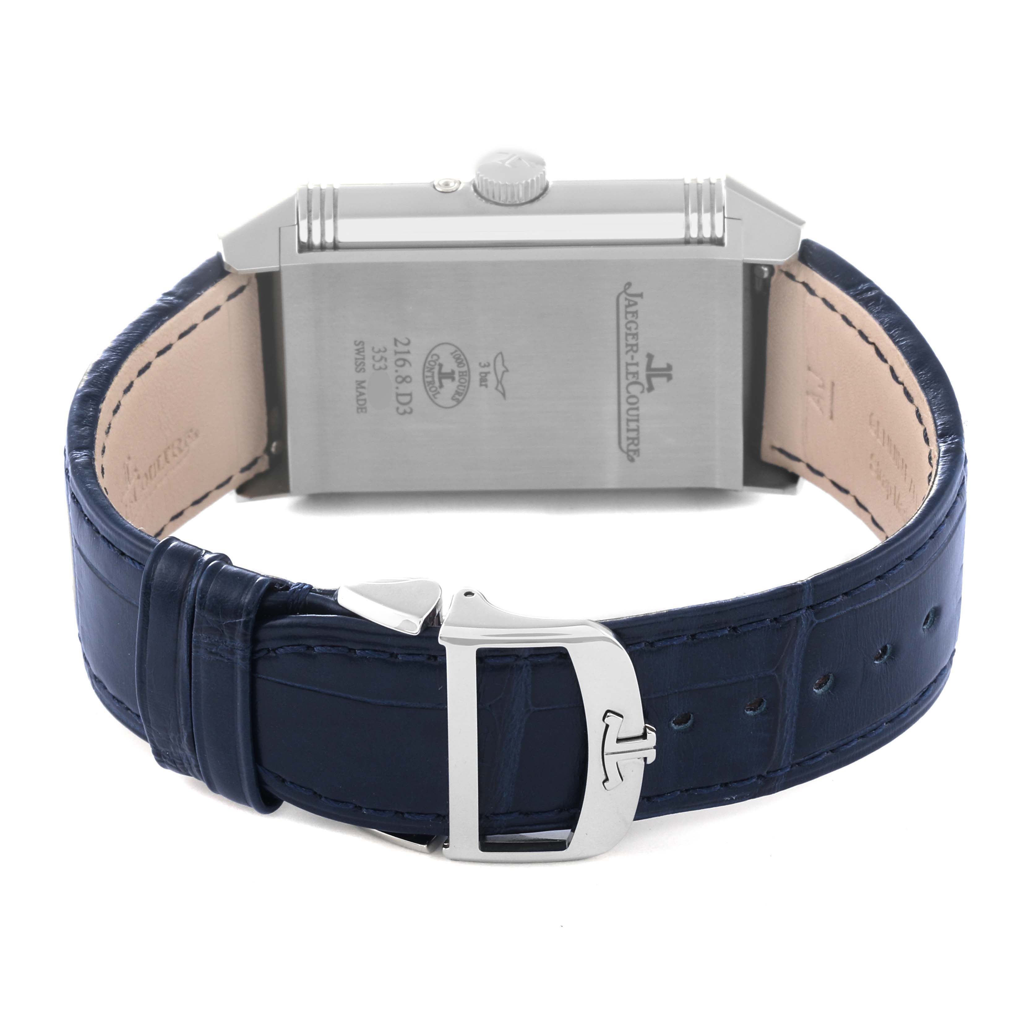 The image shows the back view and clasp of a Jaeger-LeCoultre Reverso watch with a blue leather strap.
