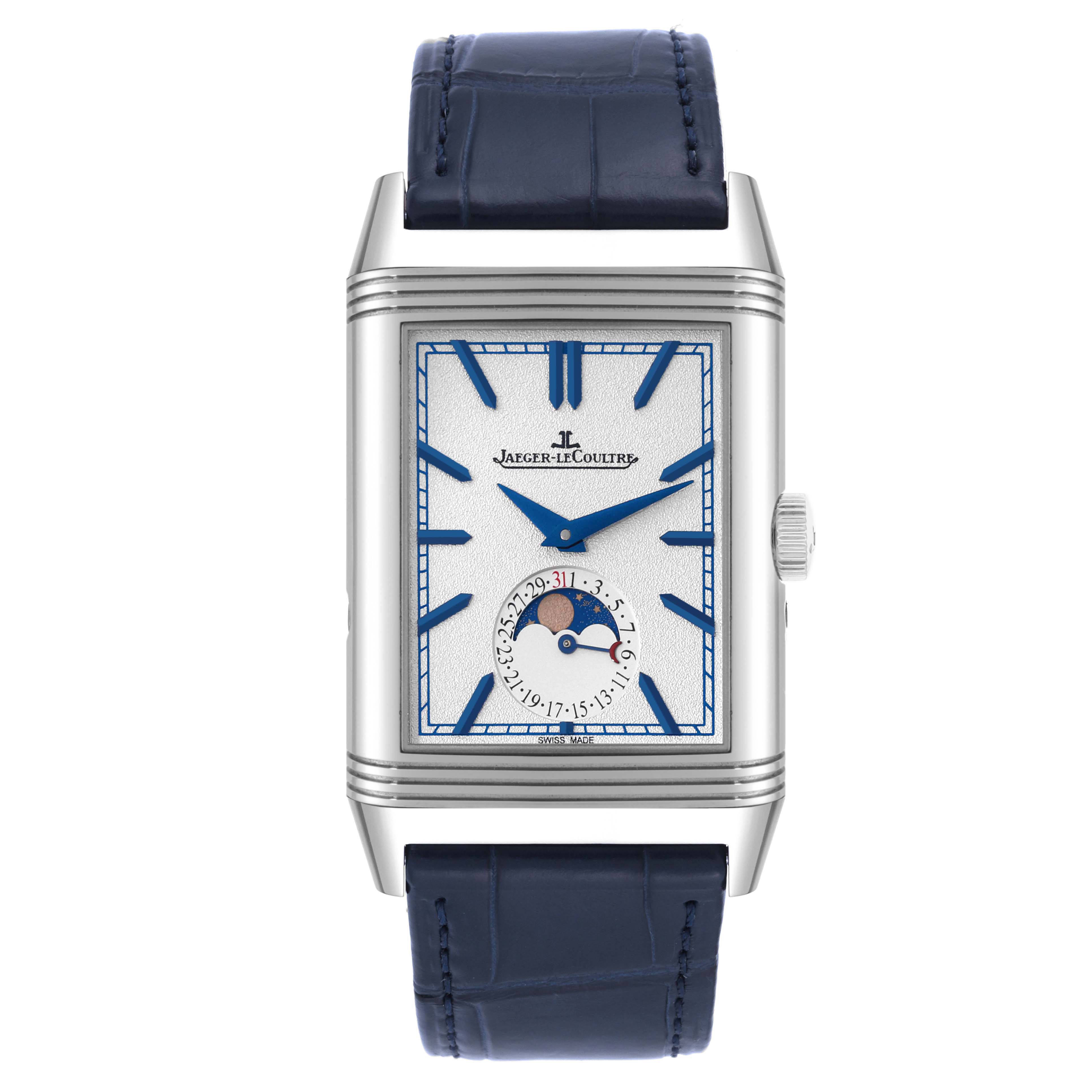 The image shows a front view of a Jaeger-LeCoultre Reverso watch, featuring a rectangular dial with blue hands and markers, and a leather strap.