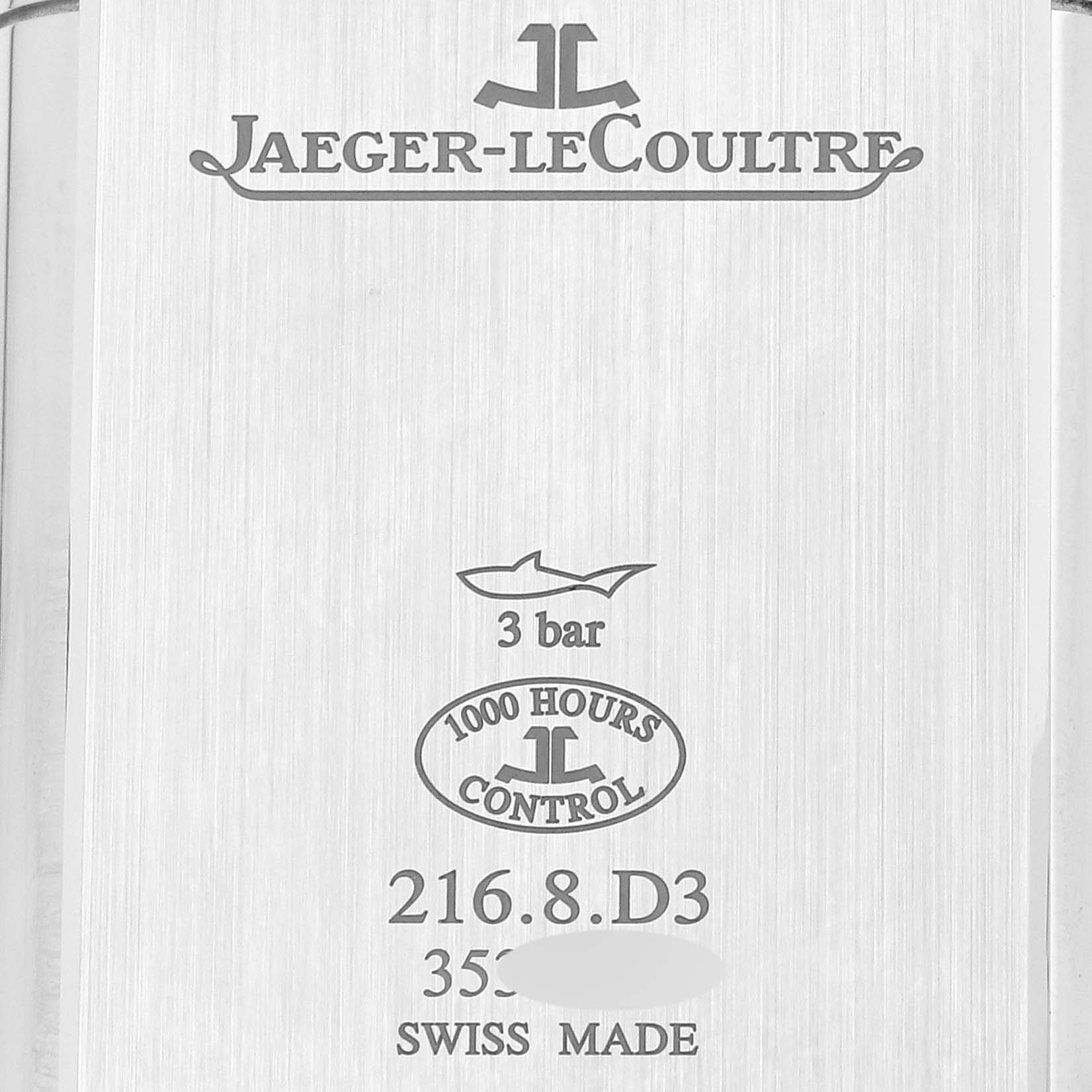The image shows the engraved back of a Jaeger LeCoultre Reverso Q3958420 Men's Stainless Steel Silver Dial Q3958420 Men's Stainless Steel Silver Dial watch, displaying branding and specifications.