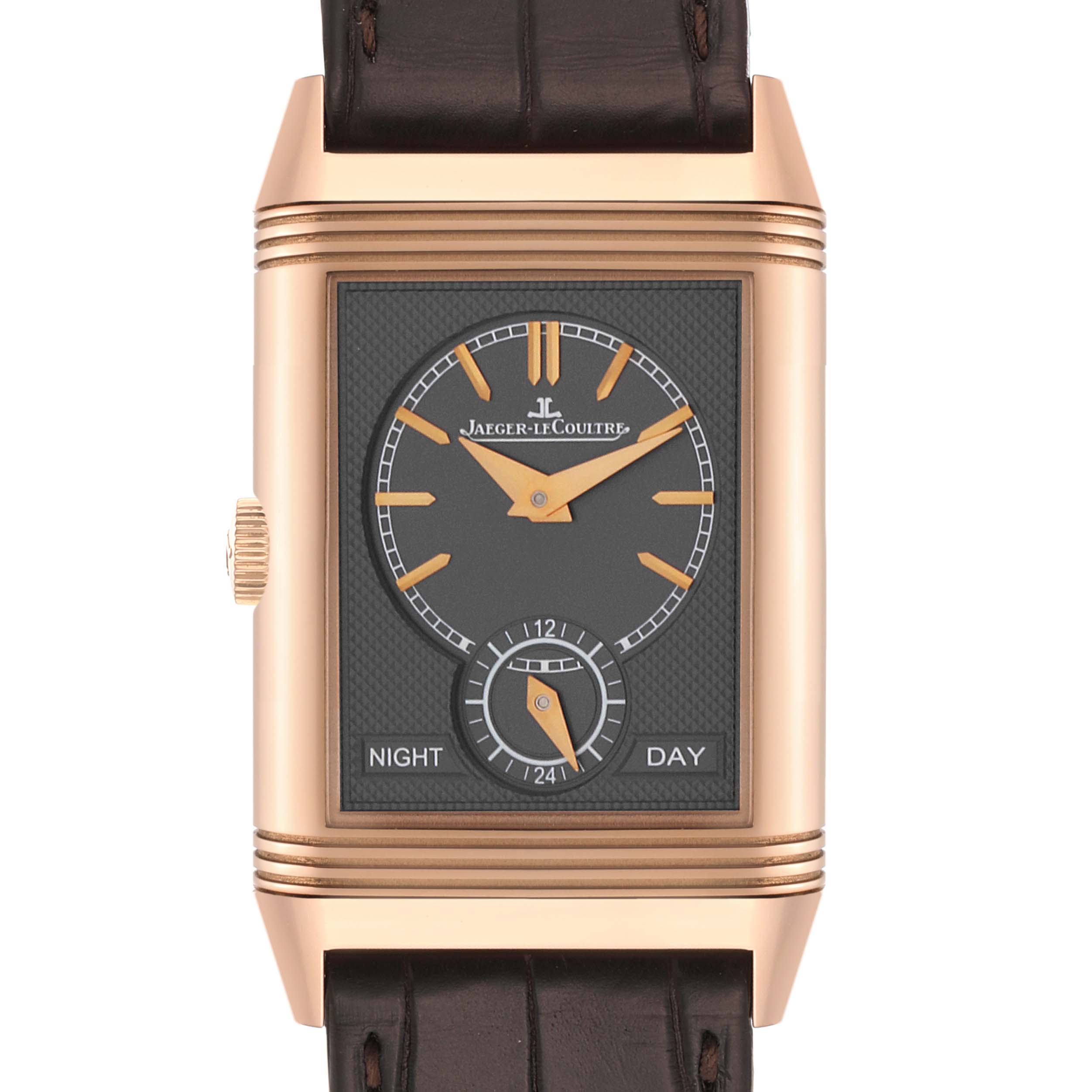 The image shows a frontal view of the Jaeger LeCoultre Reverso Q3902420 Men's Rose Gold Silver Dial Q3902420 Men's Rose Gold Silver Dial watch with a black dial and brown leather strap.