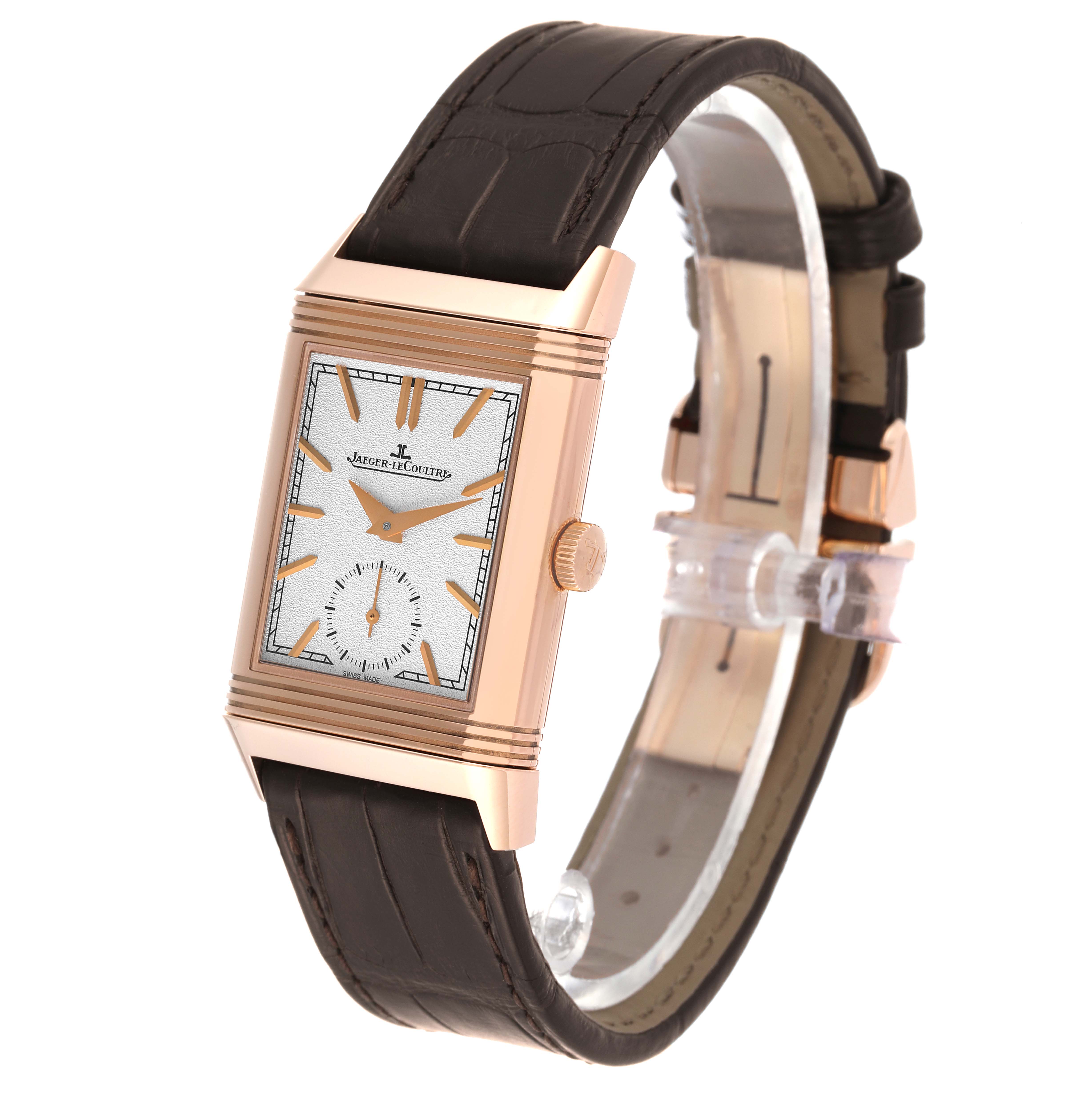 The image shows a Jaeger-LeCoultre Reverso watch from a slightly angled side view, showcasing the face, crown, and leather strap.