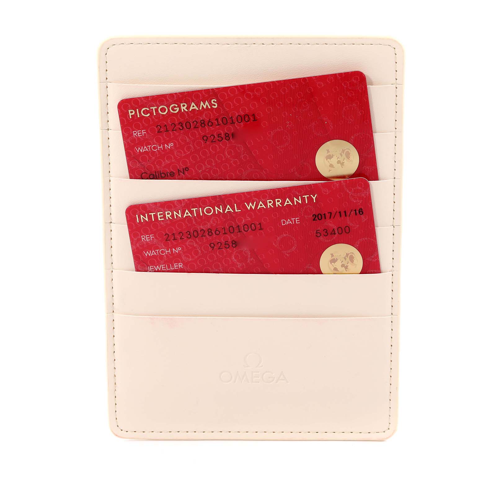 The image shows the box and cards, including pictograms and an international warranty, for the Omega 212.30.28.61.01.001 Women's Stainless Steel Black Dial 212.30.28.61.01.001 Women's Stainless Steel Black Dial Seamaster Diver 300M 28mm Quartz Ladies Watch model 212.30.28.61.01.001.