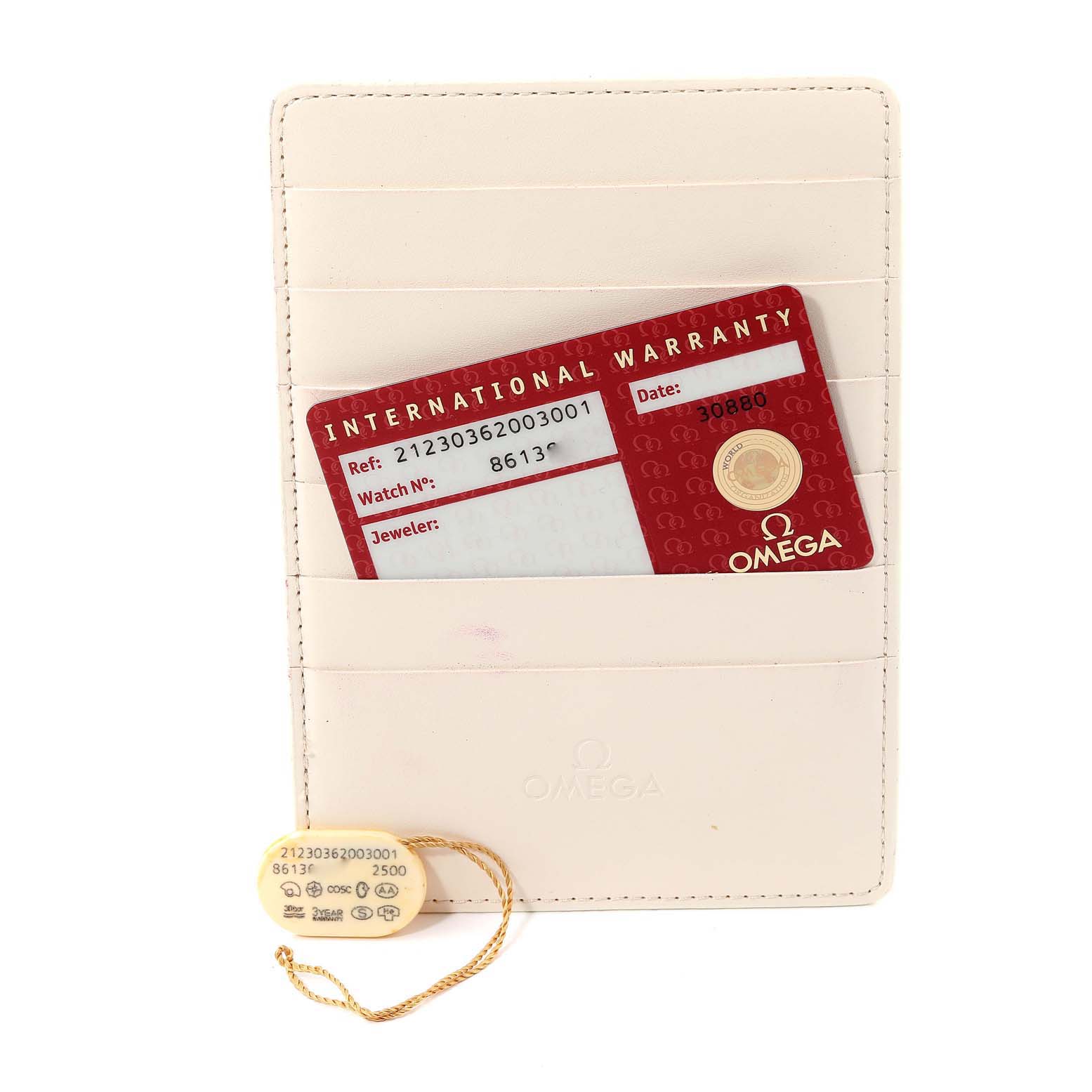 The image shows an Omega Seamaster 212.30.36.20.03.001 Men's Stainless Steel Blue Dial 212.30.36.20.03.001 Men's Stainless Steel Blue Dial international warranty card and a tag with the model details.