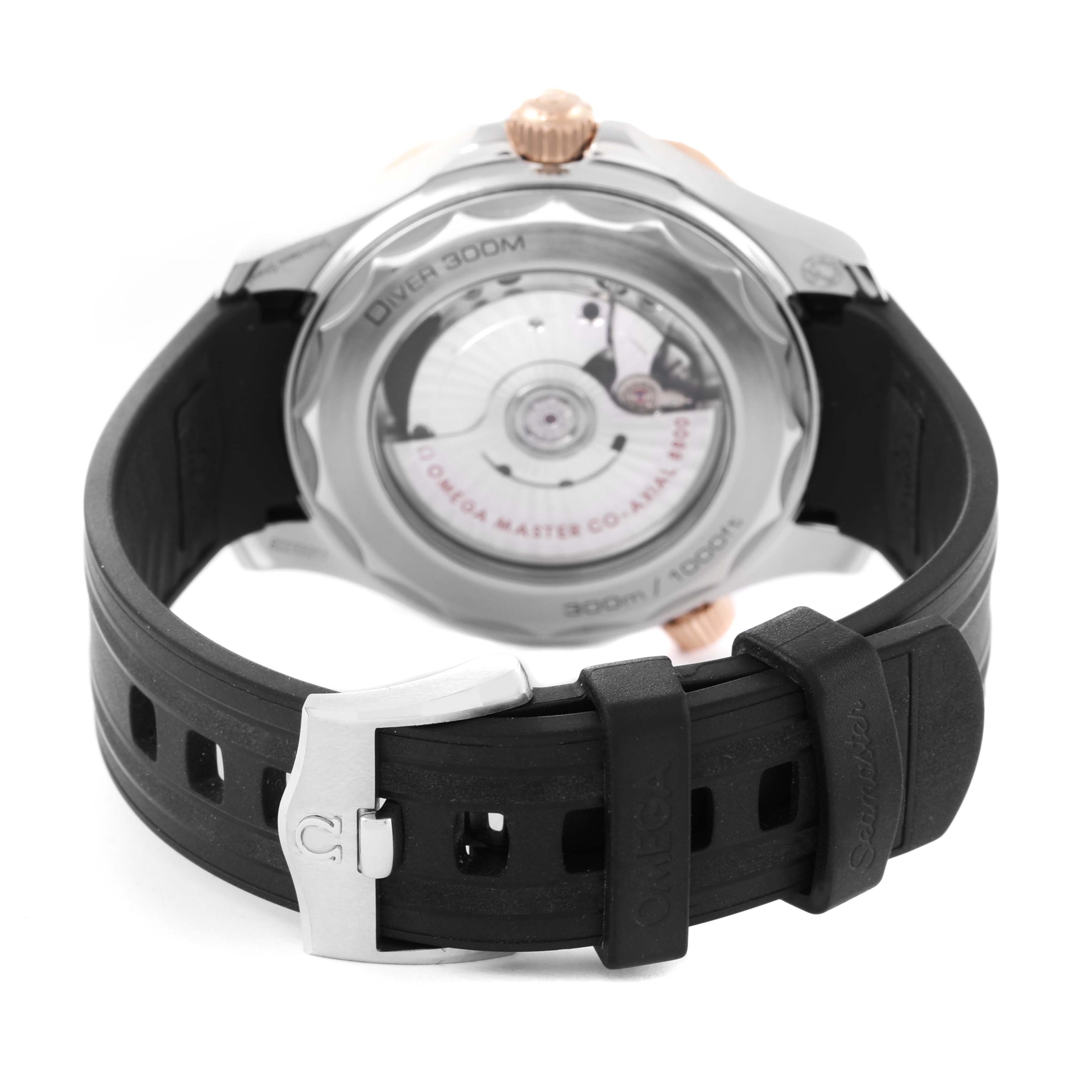 The image shows the rear view of an Omega Seamaster 210.22.42.20.01.002 Men's Steel and Gold (two tone) Black Dial 210.22.42.20.01.002 Men's Steel and Gold (two tone) Black Dial watch, including the transparent case back and black rubber strap.