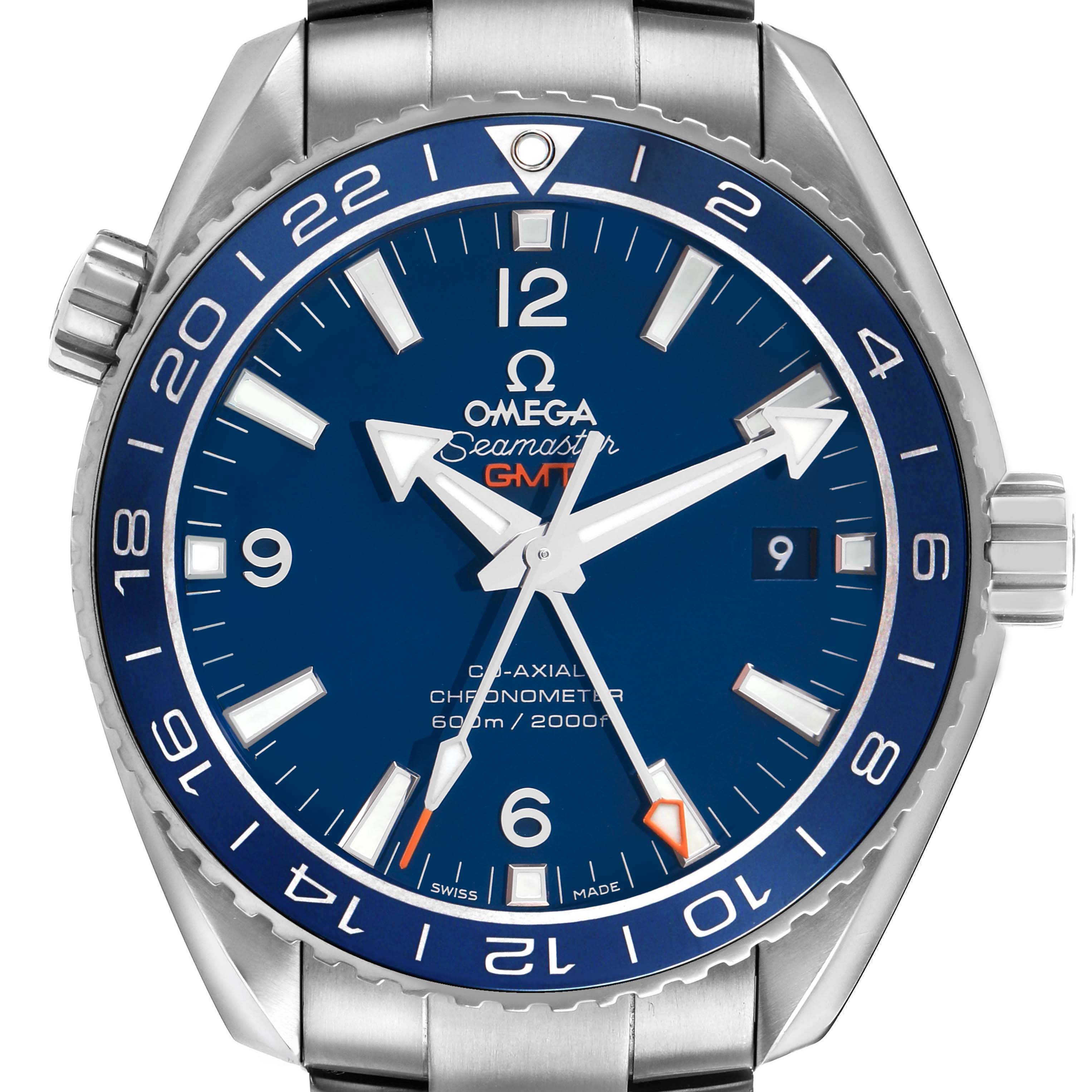 The Omega Seamaster 232.90.44.22.03.001 Men's Titanium Blue Dial watch is shown from a front angle, displaying its blue dial, GMT hand, and bezel markings.