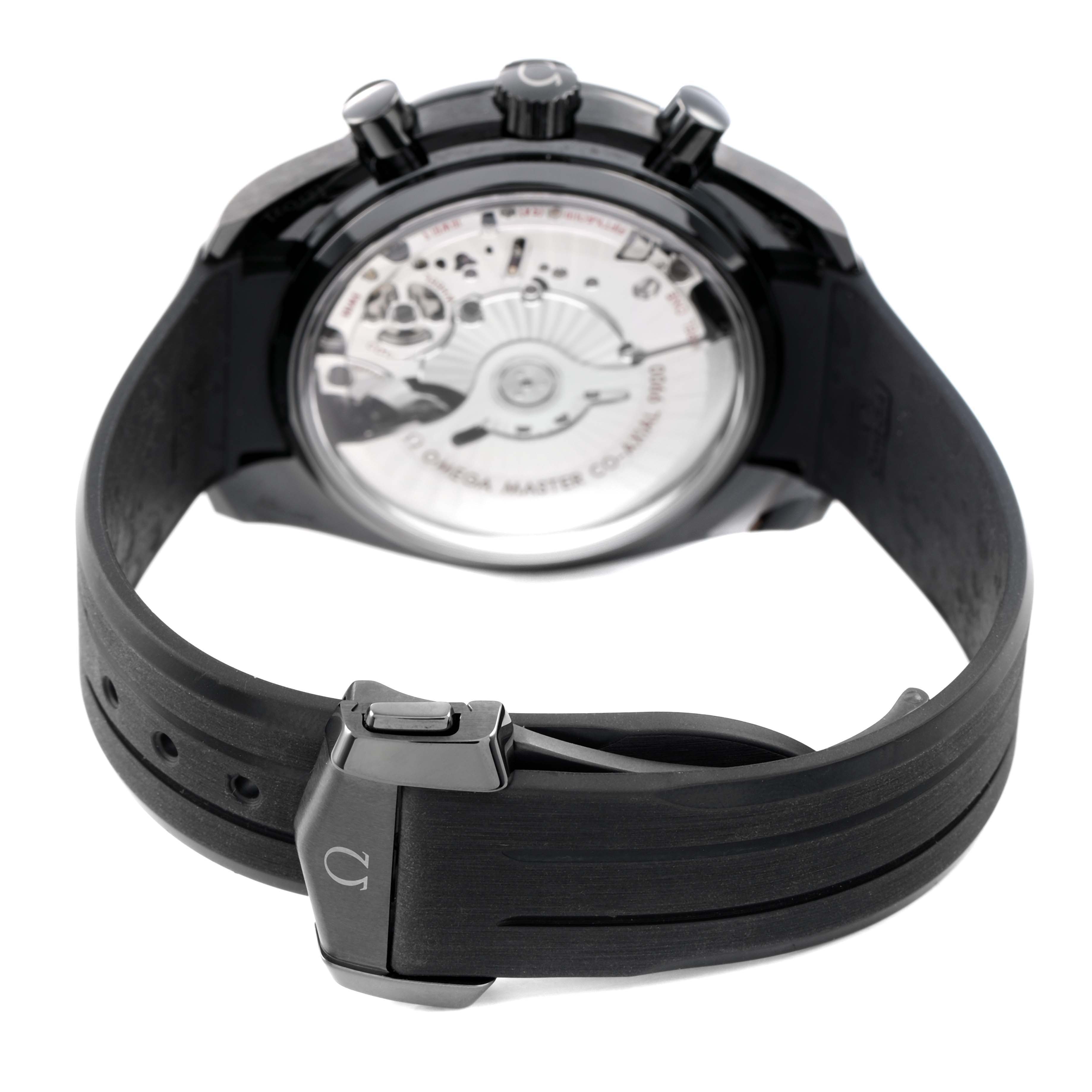 The Omega Speedmaster 310.92.44.51.01.004 Men's Ceramic Black Dial is shown from the back, displaying the case back, movement, and part of the strap and clasp.