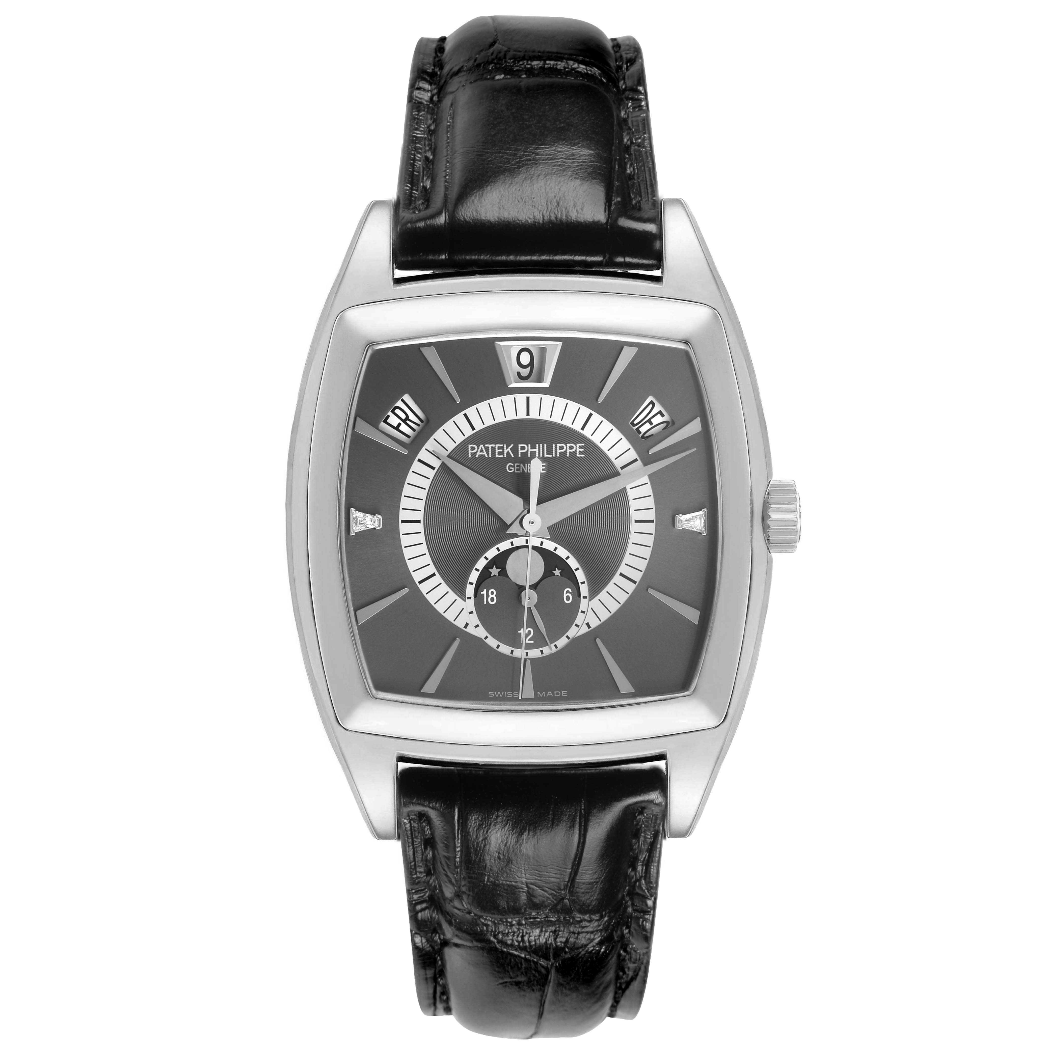 The Patek Philippe Gondolo 5135P Men's Platinum Grey Dial watch is shown from a top-down angle, featuring its rectangular case, dial details, and black leather strap.