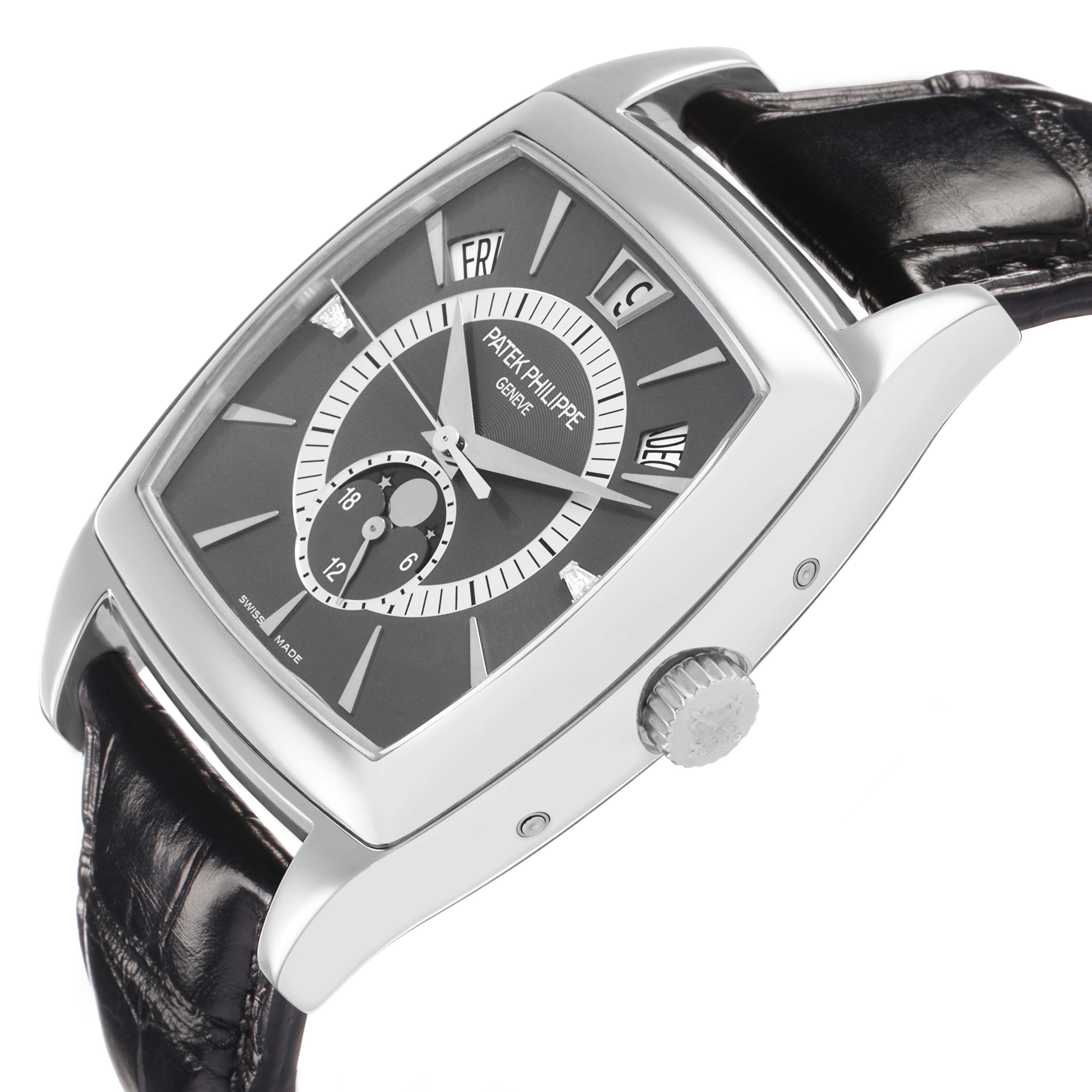 The Patek Philippe Gondolo 5135P Men's Platinum Grey Dial watch is shown at a three-quarter angle, highlighting its case, dial, crown, and strap.
