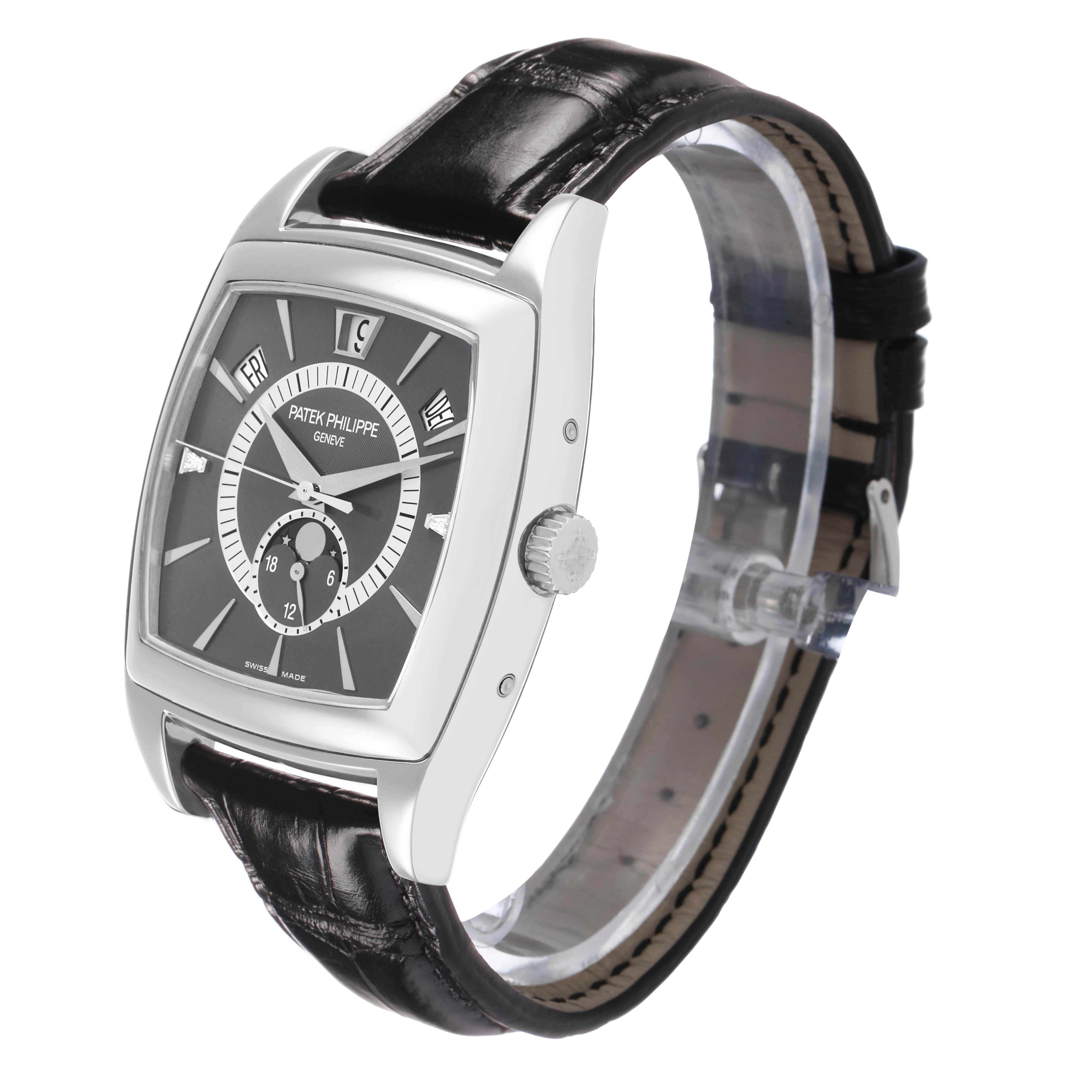 The Patek Philippe Gondolo 5135P Men's Platinum Grey Dial watch is shown at a three-quarter angle, highlighting the case, dial, crown, and leather strap.