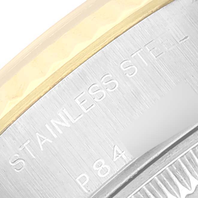 A close-up of the stainless steel casing and part of the bezel of a Rolex Datejust 79173 Women's Steel and Gold (two tone) White Dial 79173 Women's Steel and Gold (two tone) White Dial watch is shown.