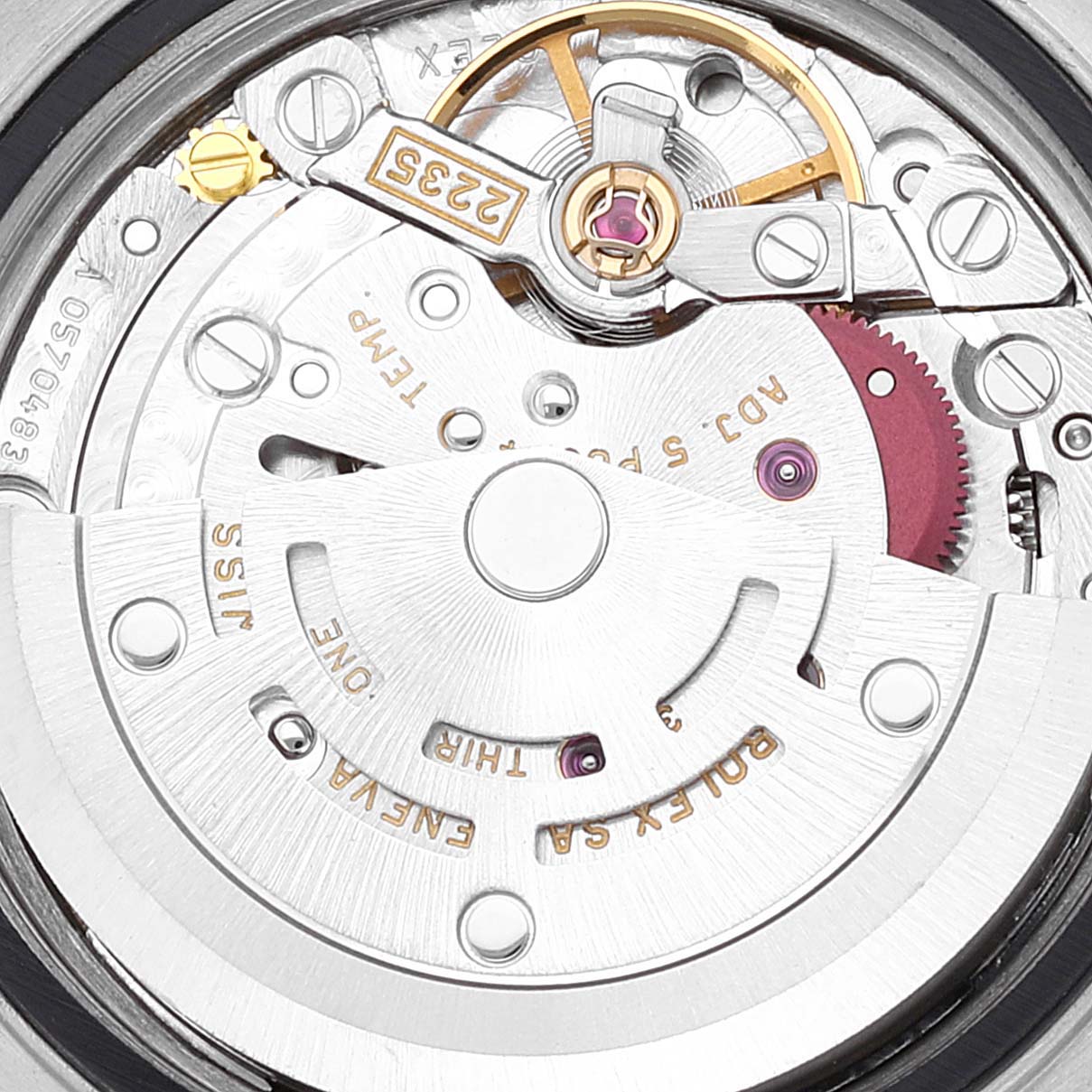 This image shows a close-up of the intricate movement and internal mechanism of a Rolex Datejust 79173 Women's Steel and Gold (two tone) White Dial 79173 Women's Steel and Gold (two tone) White Dial watch.