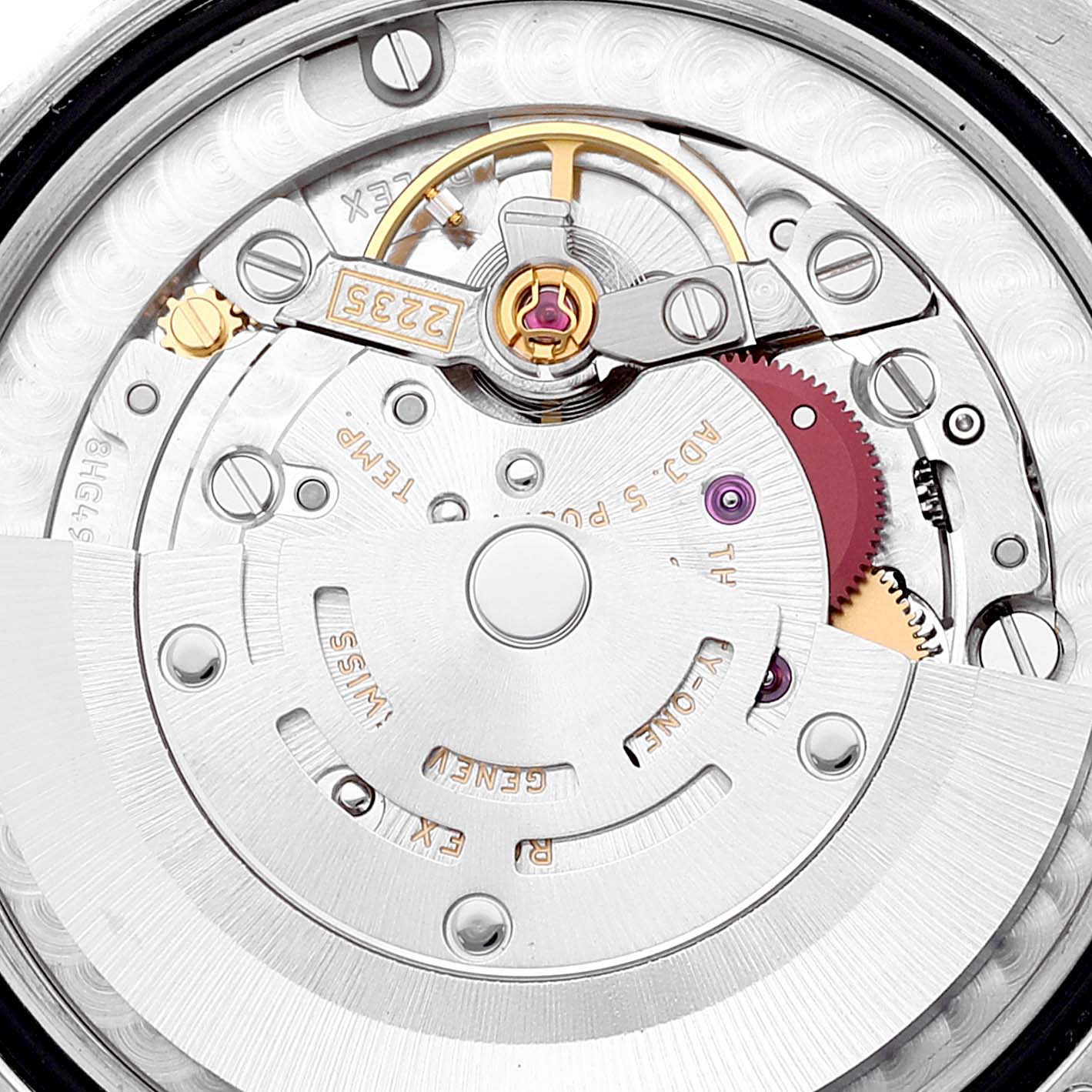 This image shows the movement mechanism of a Mid-Size Rolex watch at a close-up angle.