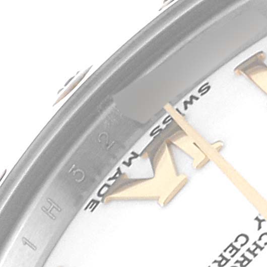 This is a close-up of the dial and bezel of a Rolex Mid-Size 178343 Women's Steel and Gold (two tone) White Dial 178343 Women's Steel and Gold (two tone) White Dial watch, showing part of the hour markers and "Swiss Made" text.