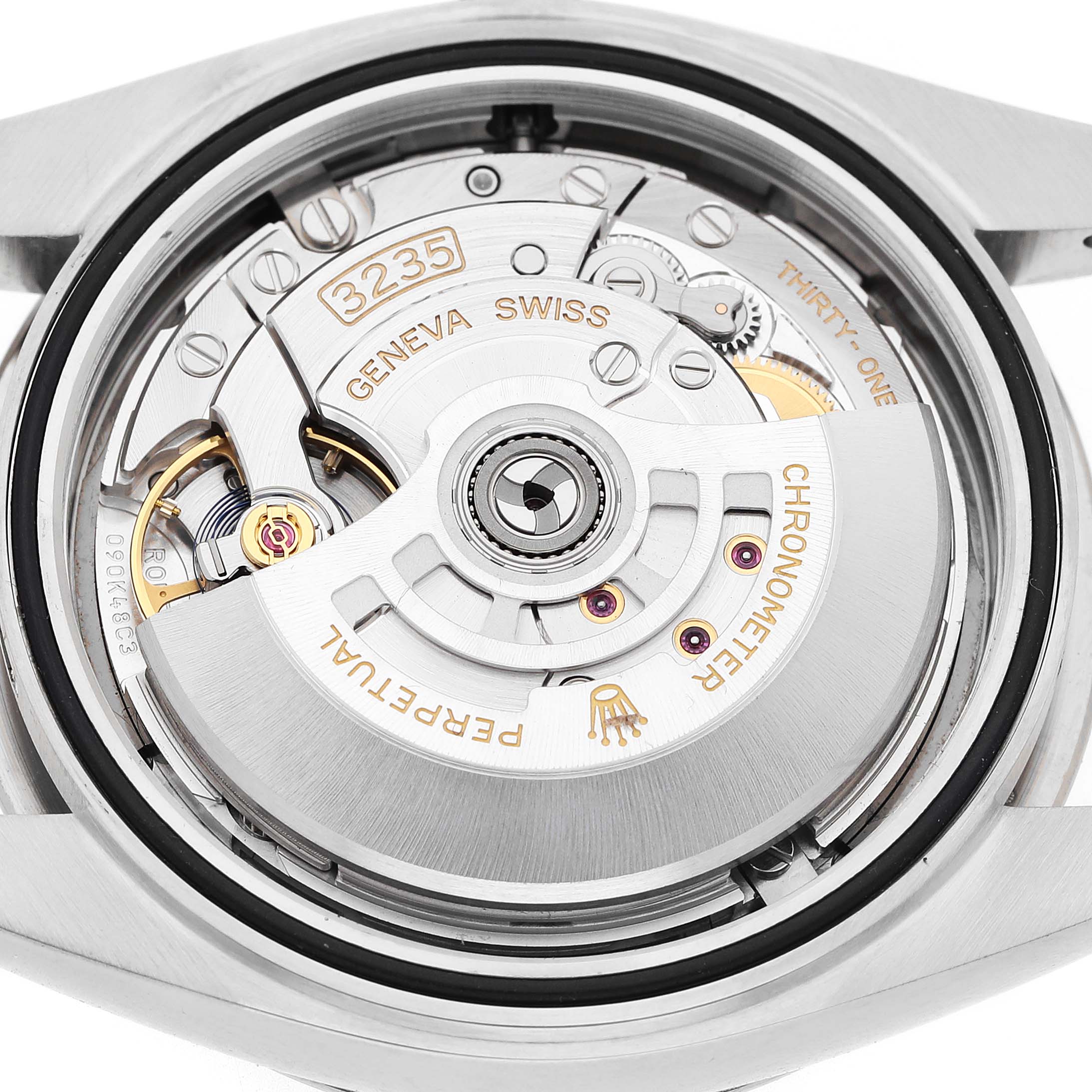 The image shows the movement of a Rolex Datejust 41 126334 Men's Stainless Steel Grey Dial, displaying the rotor and mechanical components from the back.