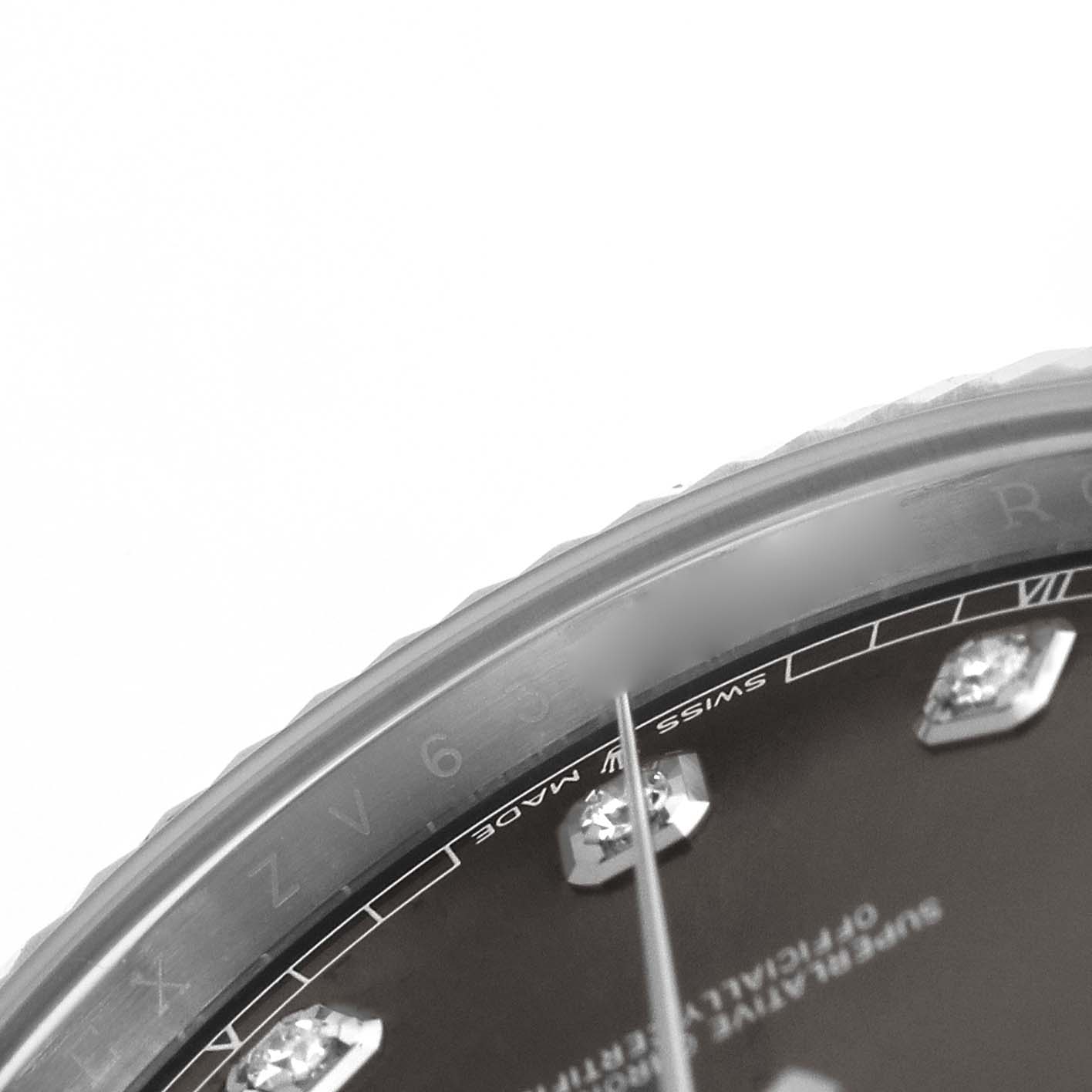 The image shows a close-up of the dial and bezel edge of the Rolex Datejust 41 126334 Men's Stainless Steel Grey Dial, highlighting the "Swiss Made" text and diamond markers.