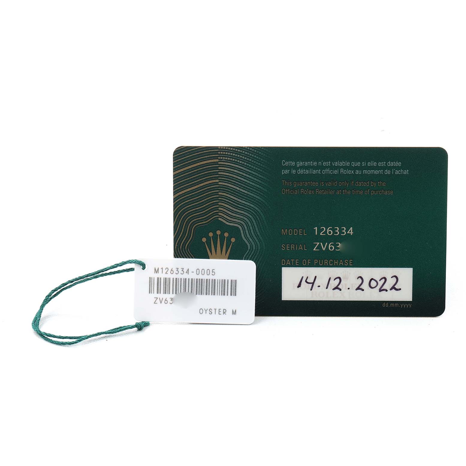 The image shows a Rolex Datejust 41 126334 Men's Stainless Steel Grey Dial model warranty card and tag, featuring model and serial numbers.