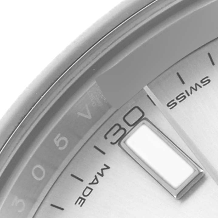 The image shows a close-up angle of a Rolex Datejust 41 116300 Men
s Stainless Steel Silver Dial 116300 Men
s Stainless Steel Silver Dial, highlighting part of the dial, markers, and date wheel.