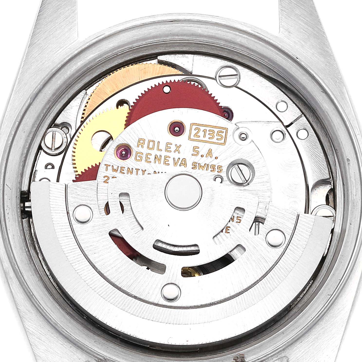 The image shows a close-up of the Rolex Datejust 69173 Women's Steel and Gold (two tone) Silver Dial 69173 Women's Steel and Gold (two tone) Silver Dial model's movement and internal gears from the back.