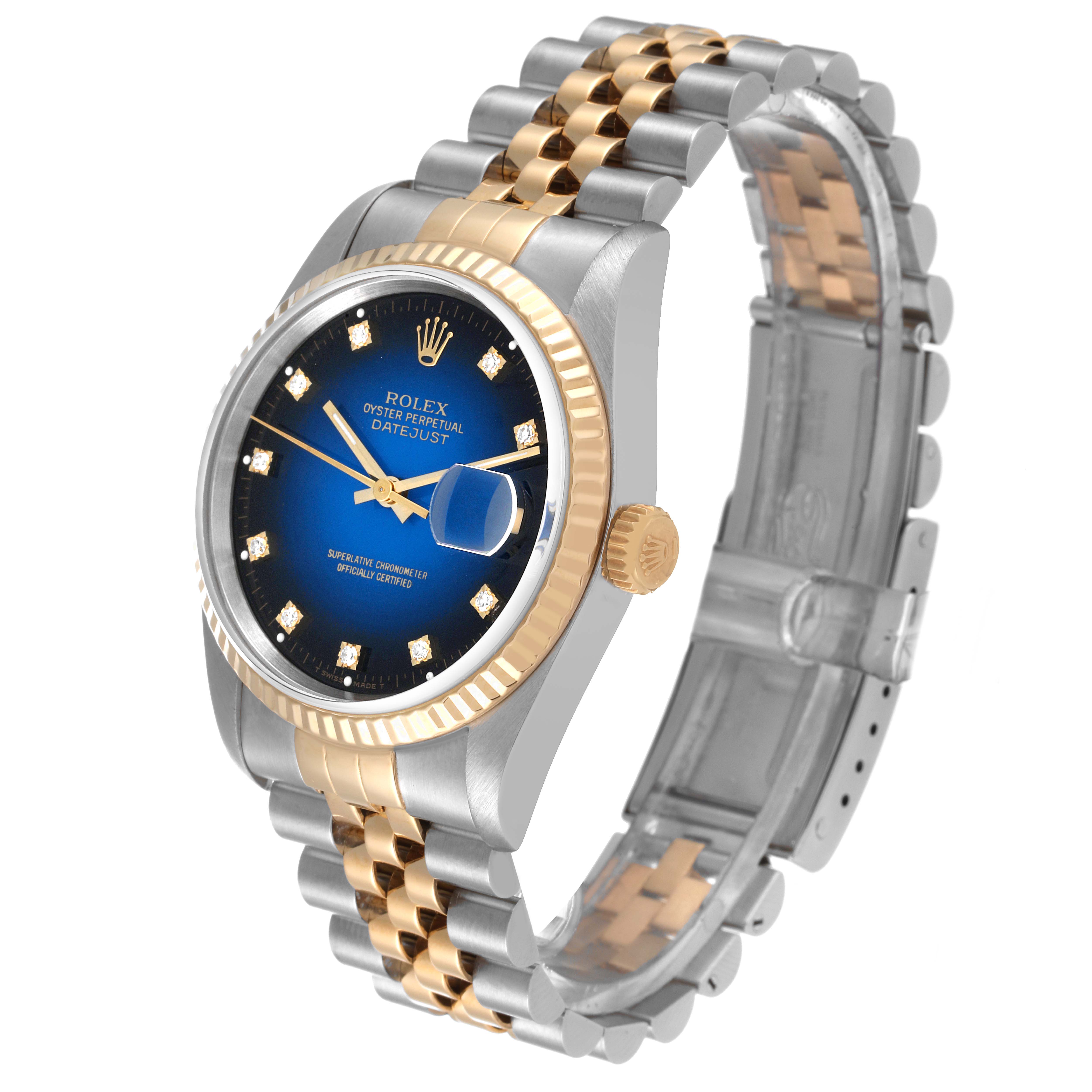 The image shows a Rolex Datejust 16233 Men's Steel and Gold (two tone) Blue Dial 16233 Men's Steel and Gold (two tone) Blue Dial model watch at a three-quarter angle, highlighting the blue dial, bezel, and two-tone bracelet.