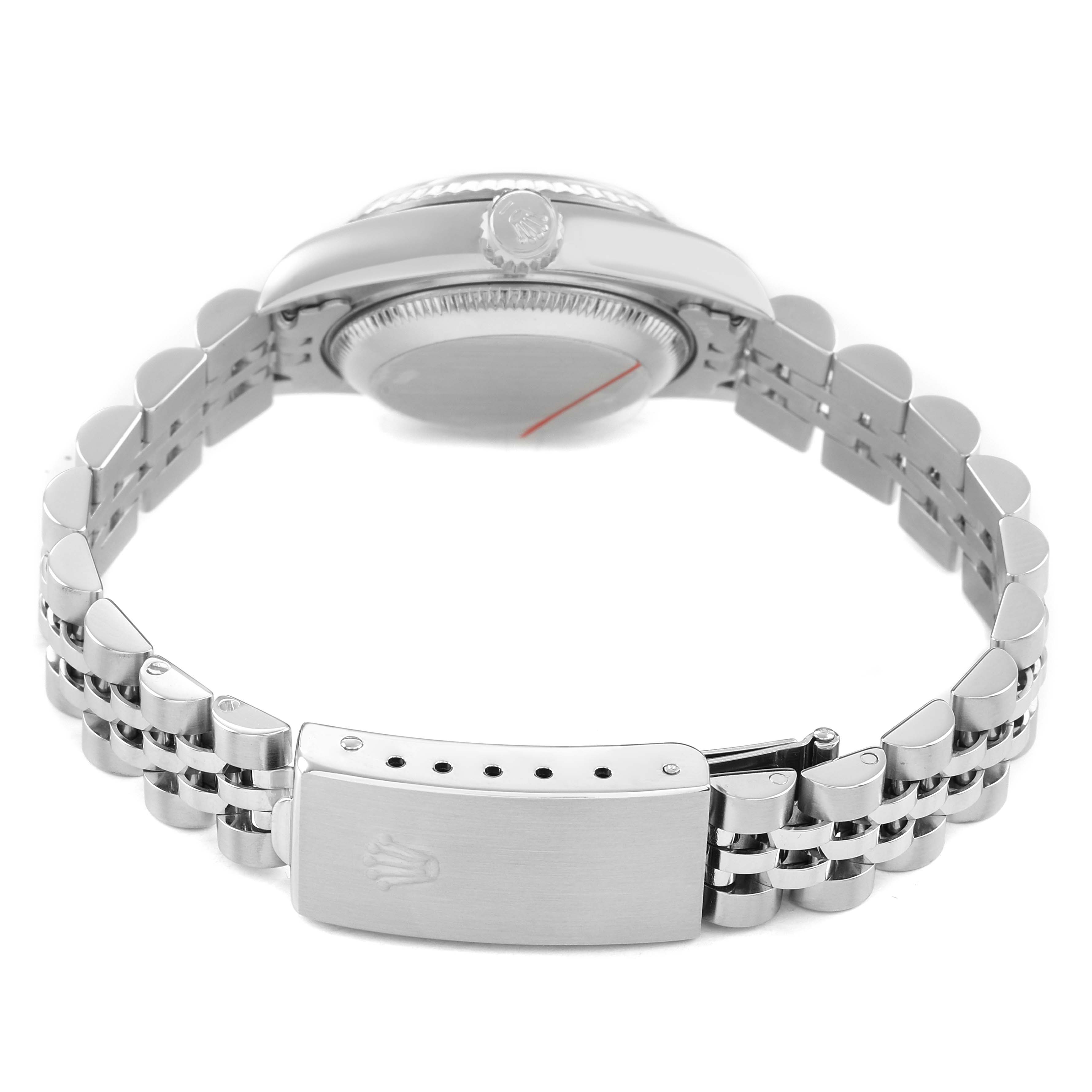 The image shows a Rolex Datejust 79174 Women's Stainless Steel Silver Dial watch from a rear angle, highlighting the bracelet, clasp, and case back.