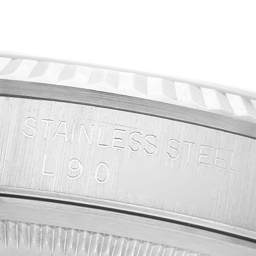 This image shows a close-up of the side engraving on a Rolex Datejust 16234 Men's Stainless Steel Silver Dial watch, highlighting the "STAINLESS STEEL" text.