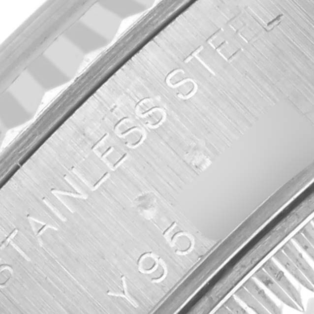 The image shows a close-up of the Rolex Datejust 79174 Women's Stainless Steel Silver Dial 79174 Women's Stainless Steel Silver Dial's case side, focusing on the engraved "STAINLESS STEEL" marking.
