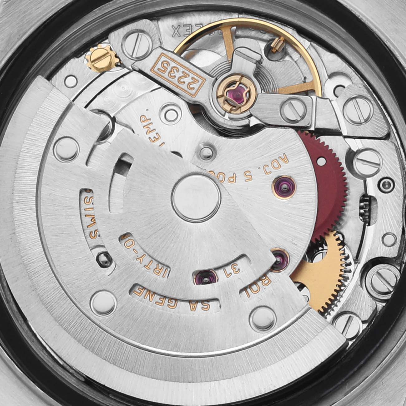 The image shows a close-up view of the Rolex Datejust 79174 Women's Stainless Steel Silver Dial 79174 Women's Stainless Steel Silver Dial movement with visible gears and rotor.