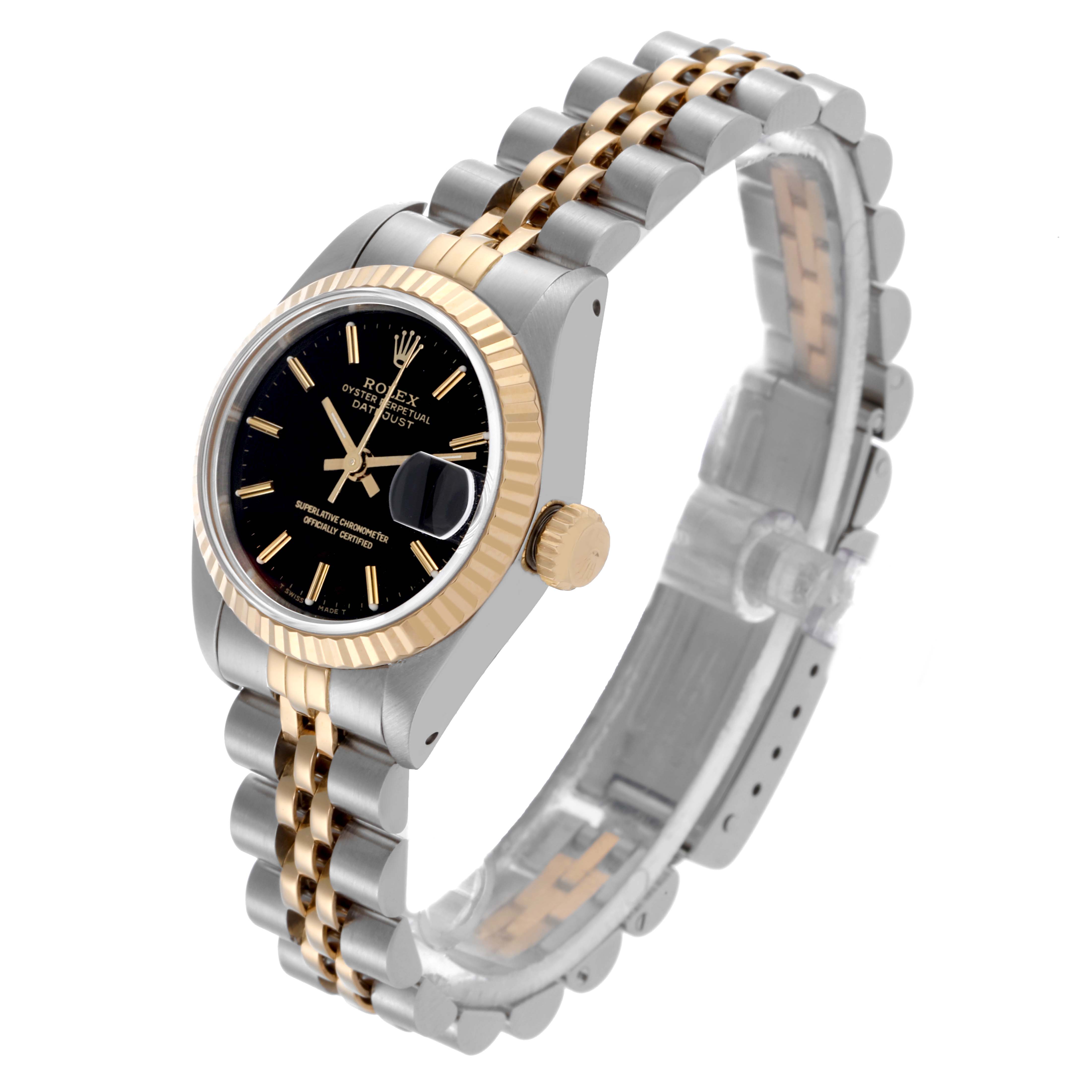 The Rolex Datejust 69173 Women's Steel and Gold (two tone) Black Dial 69173 Women's Steel and Gold (two tone) Black Dial watch is shown at a three-quarter angle, highlighting its black dial, fluted bezel, and two-tone bracelet.