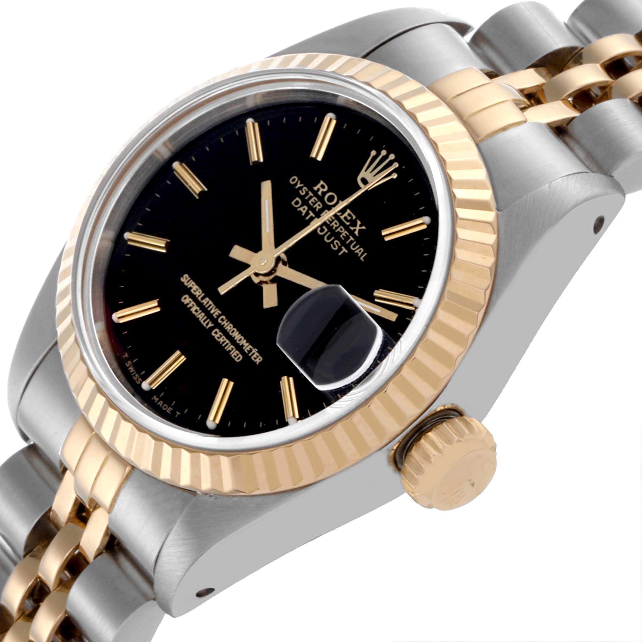 The Rolex Datejust 69173 Women's Steel and Gold (two tone) Black Dial 69173 Women's Steel and Gold (two tone) Black Dial watch is shown at an angled side view, featuring the dial, bezel, crown, and part of the bracelet.