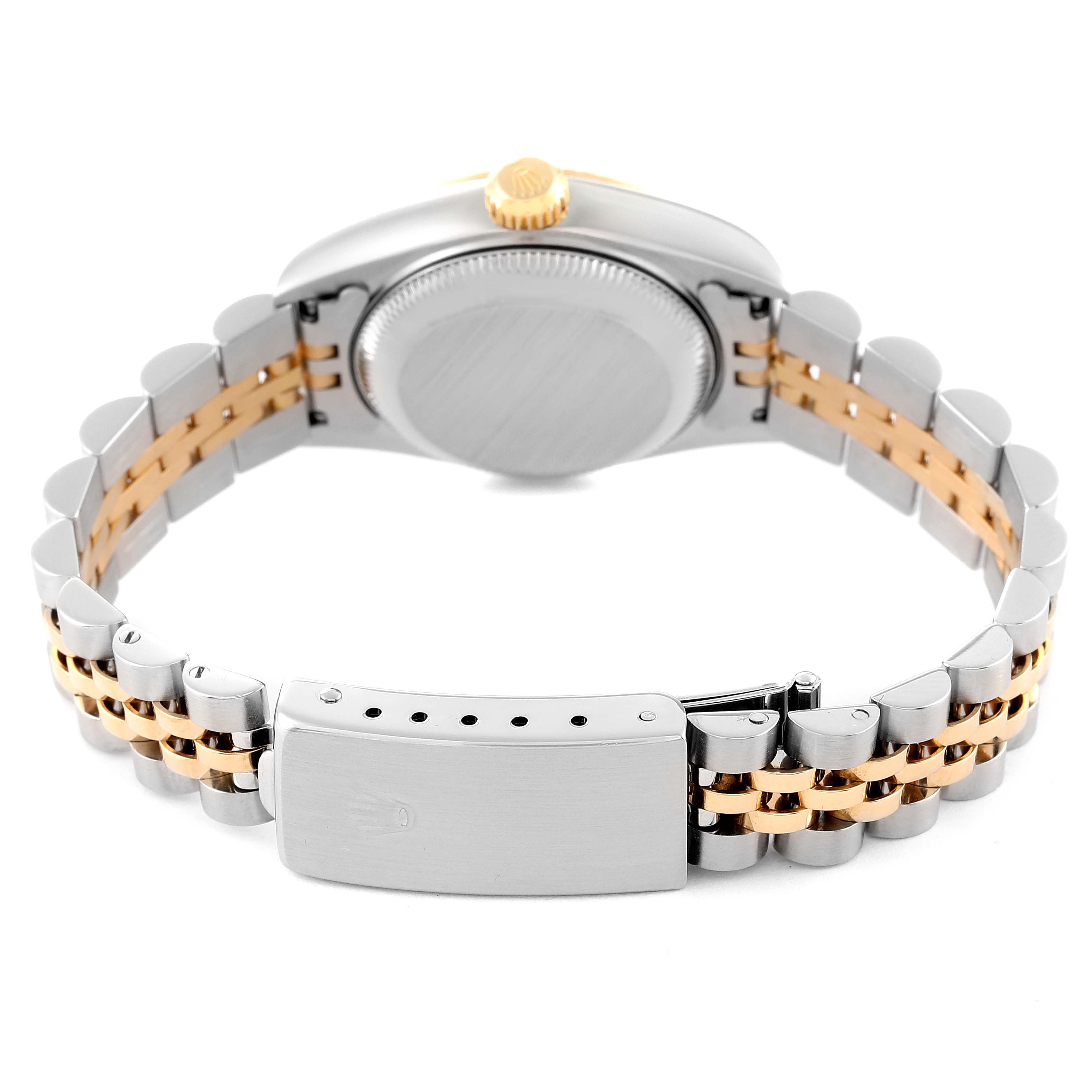 This image shows the back and bracelet of a Rolex Datejust 79173 Women's Steel and Gold (two tone) Champagne Dial 79173 Women's Steel and Gold (two tone) Champagne Dial watch, highlighting its clasp and crown.