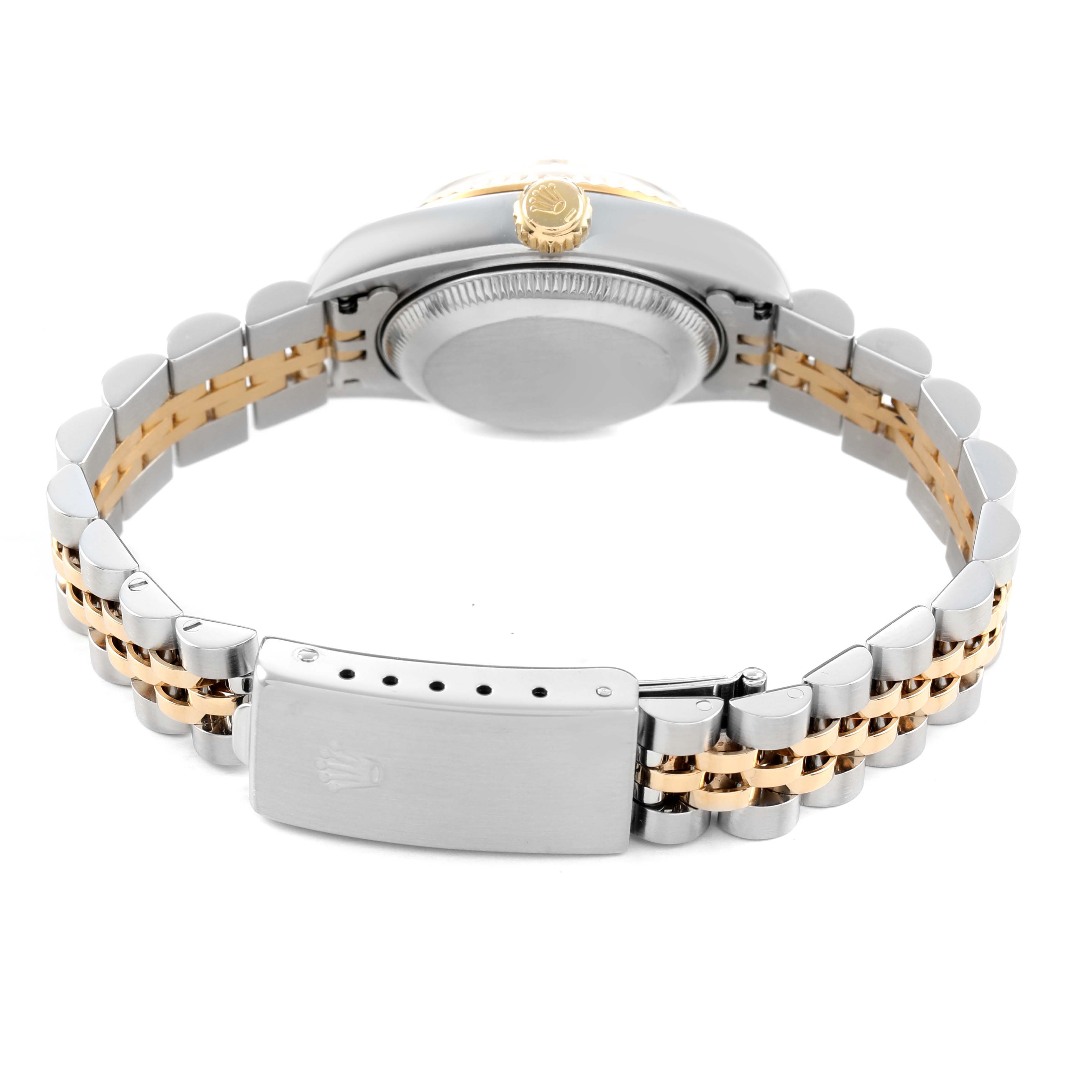 The Rolex Datejust 69173 Women's Steel and Gold (two tone) Champagne Dial watch is shown from the rear, highlighting the case back, crown, and two-tone Jubilee bracelet with clasp.