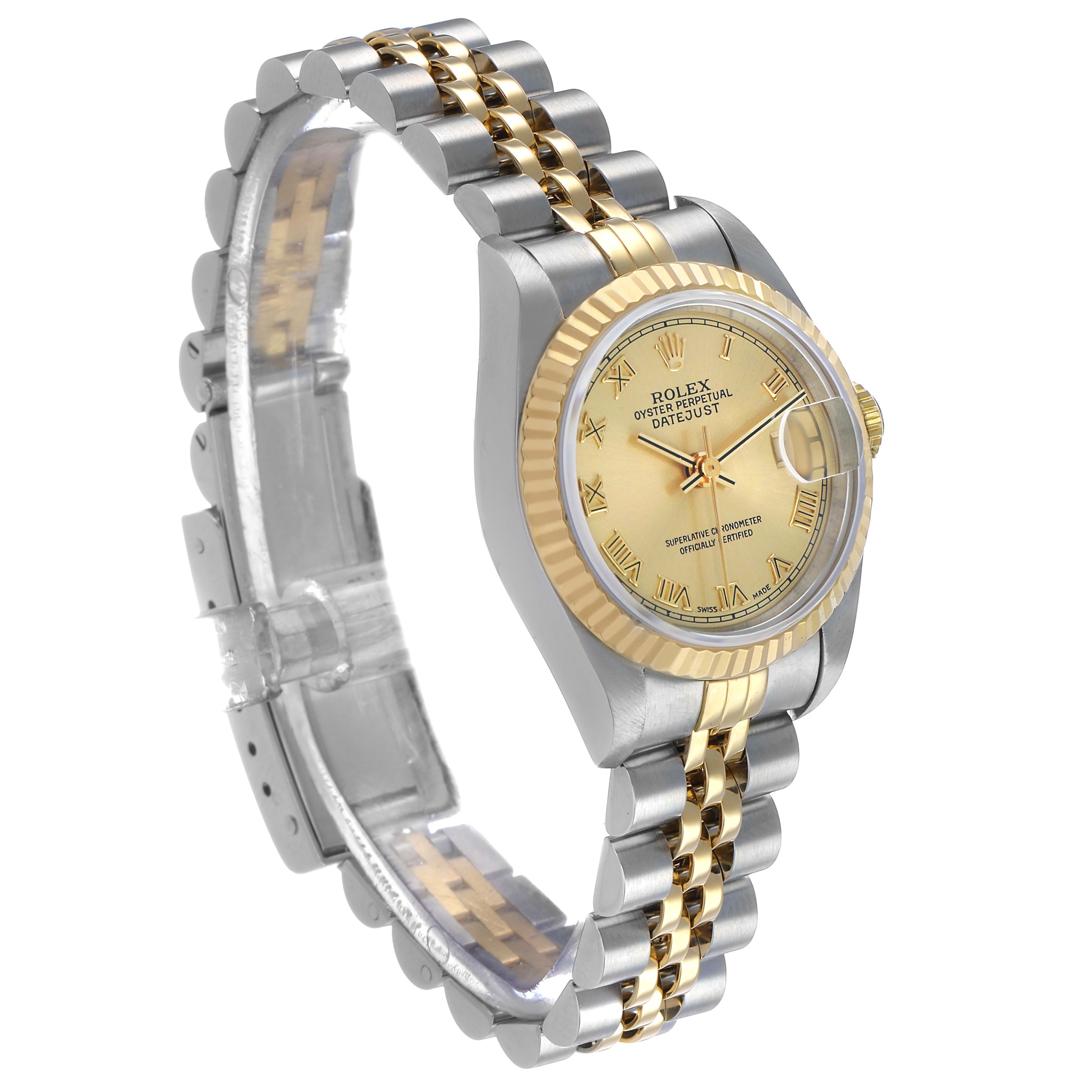 The Rolex Datejust 69173 Women's Steel and Gold (two tone) Champagne Dial watch is shown from a side angle, highlighting the face, bezel, and two-tone bracelet.