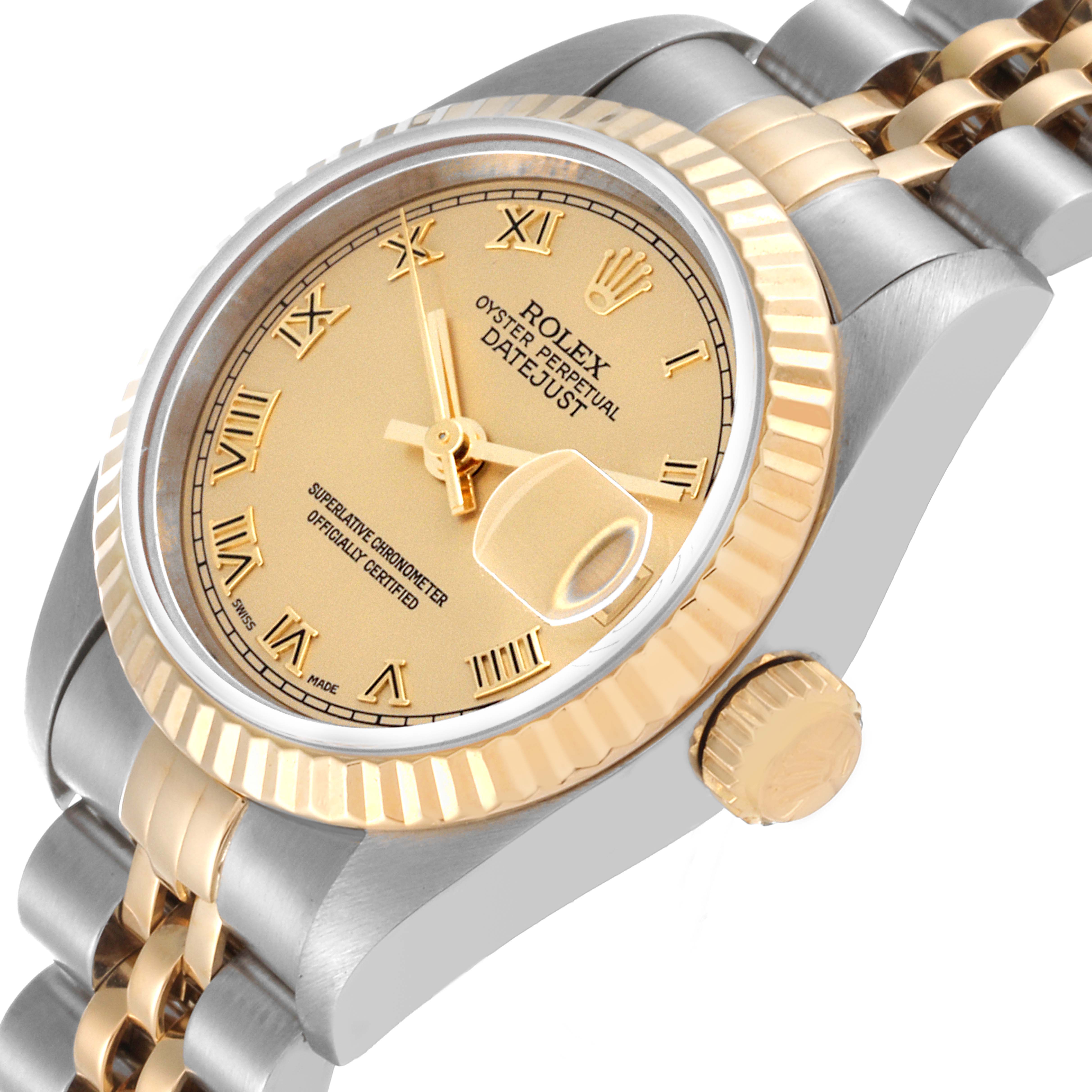 This image shows a close-up angle of the dial, crown, and part of the bracelet of the Rolex Datejust 79173 Women's Steel and Gold (two tone) Champagne Dial 79173 Women's Steel and Gold (two tone) Champagne Dial watch.