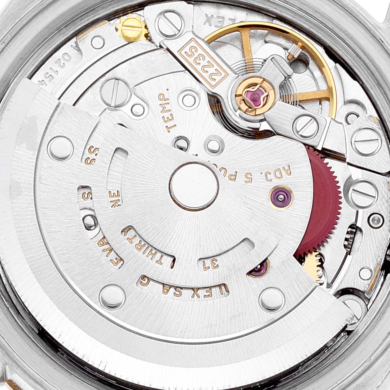 This image shows the internal mechanism of a Rolex Datejust 79173 Women's Steel and Gold (two tone) Silver Dial 79173 Women's Steel and Gold (two tone) Silver Dial watch, displaying its movement and intricate components from a close-up angle.